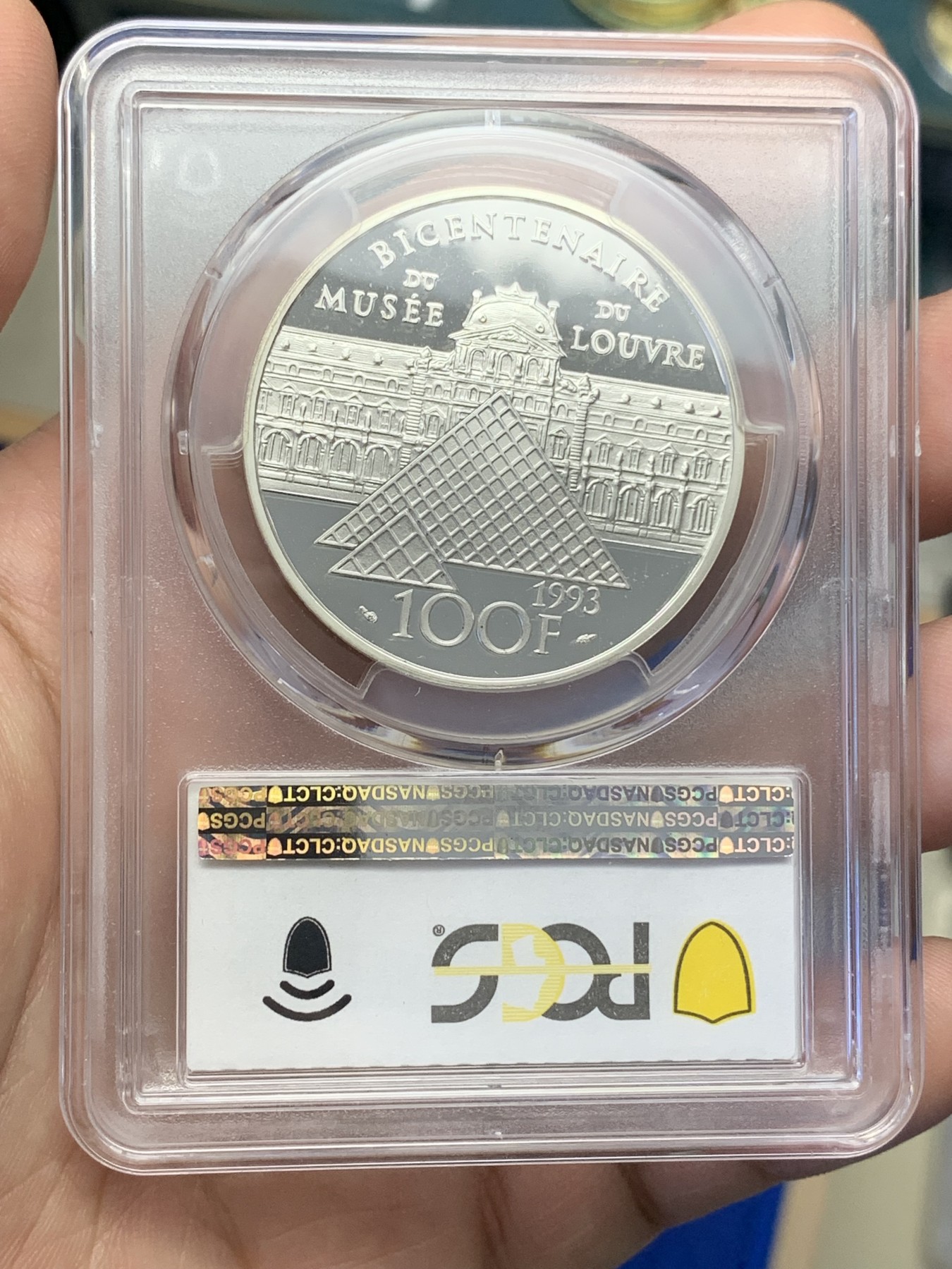 《竞宝斋》第193场-周日，周一 2场 (全场包邮) PCGS-PR69DCAM 冠军分 法国1993年自由引导人民100法郎大银币，自由女神高举旗帜，刻画生动。深度镜面，无暇冠军品质。