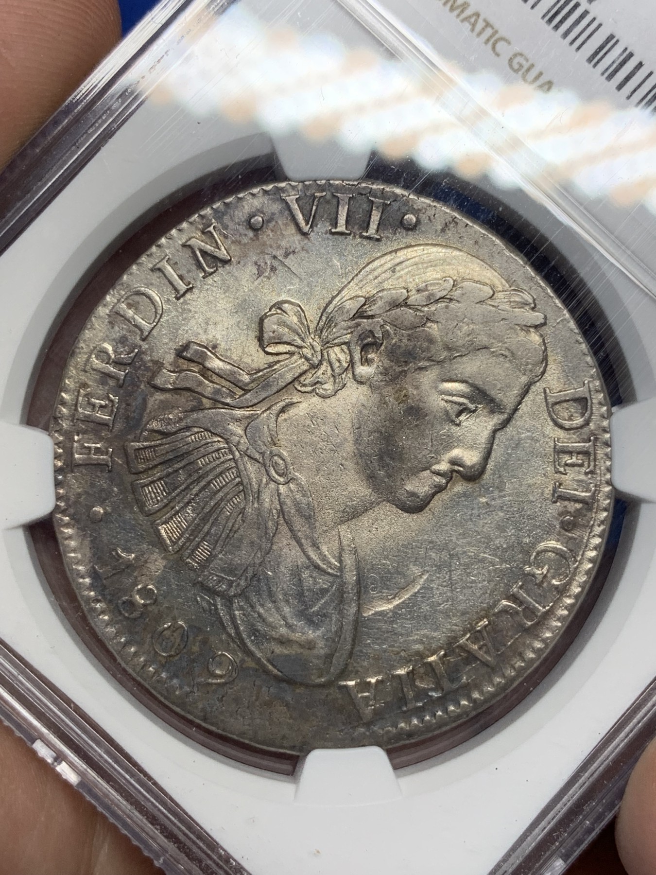 《竞宝斋》第194场-周日，周一 2场 (全场包邮) NGC MS61 墨西哥1809年费七戎装版8R双柱大银币
