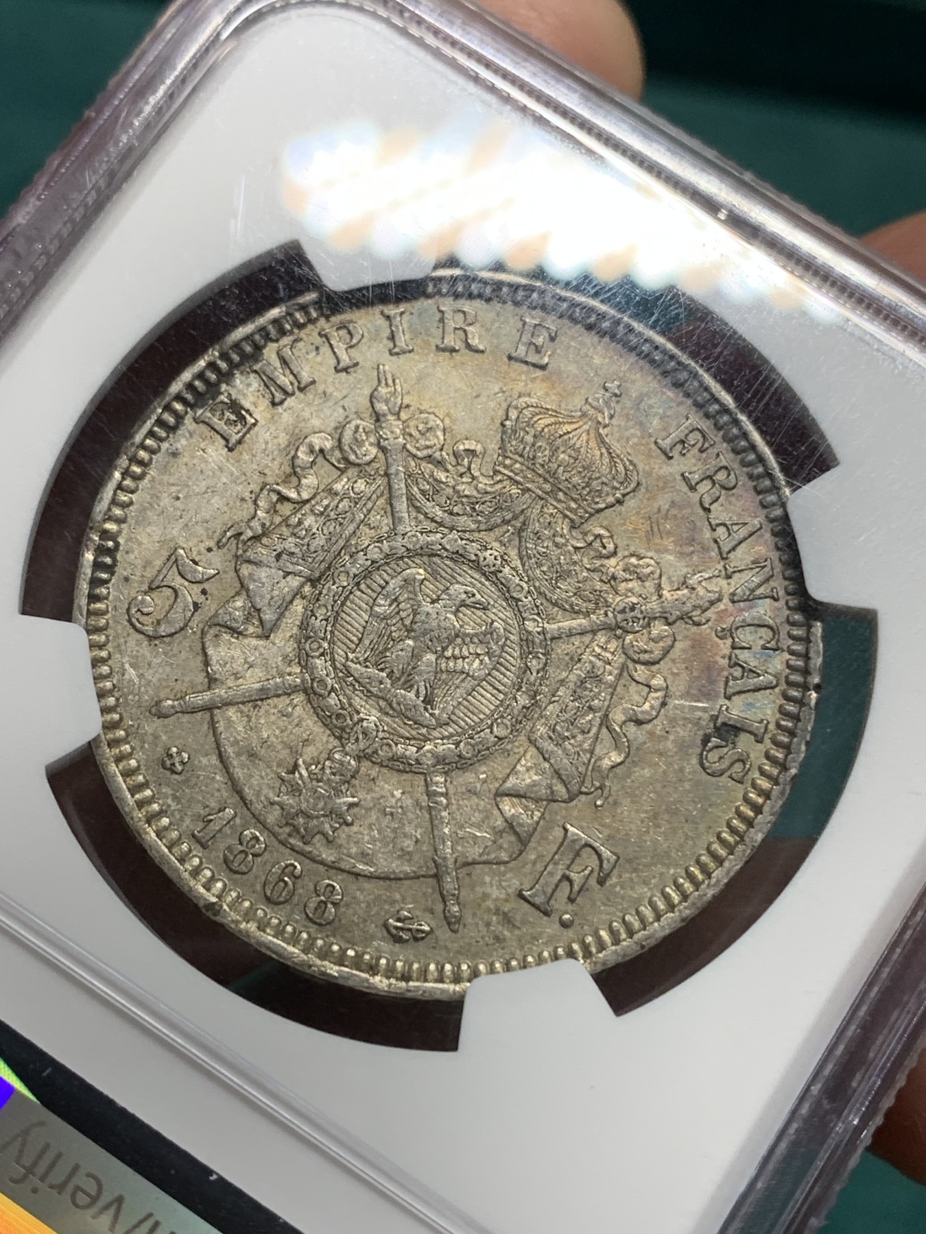《竞宝斋》第194场-周日，周一 2场 (全场包邮) NGC AU53 法国1868年拿破仑三世5法郎银币 极品五彩 低评状态非常好 AU中的战斗机