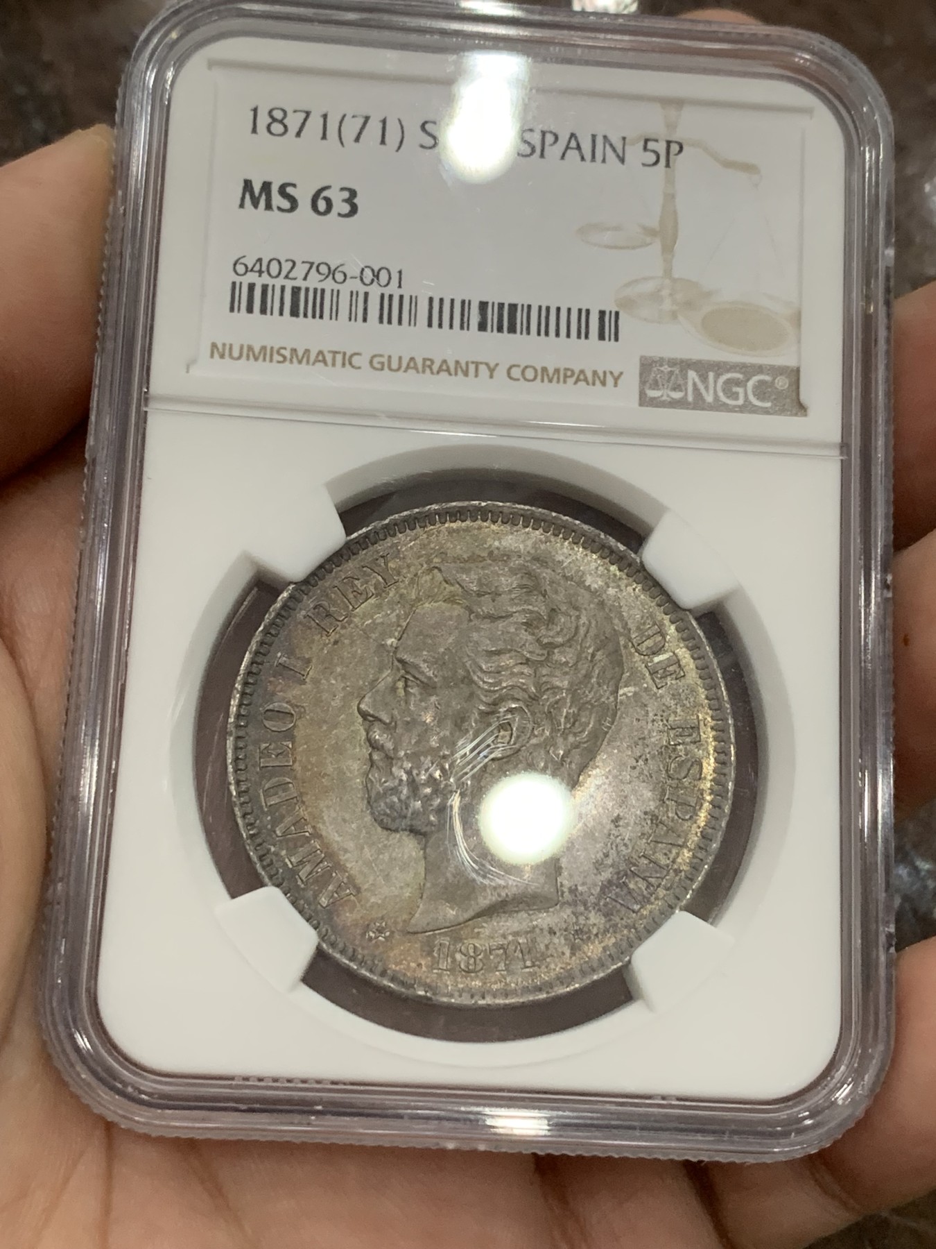 《竞宝斋》第194场-周日，周一 2场 (全场包邮) NGC-MS63 西班牙 1871年 阿马迪奥一世 5比塞塔双柱银币，难得高分，正反深五彩包浆，均匀且自然，稀缺品种高分难觅