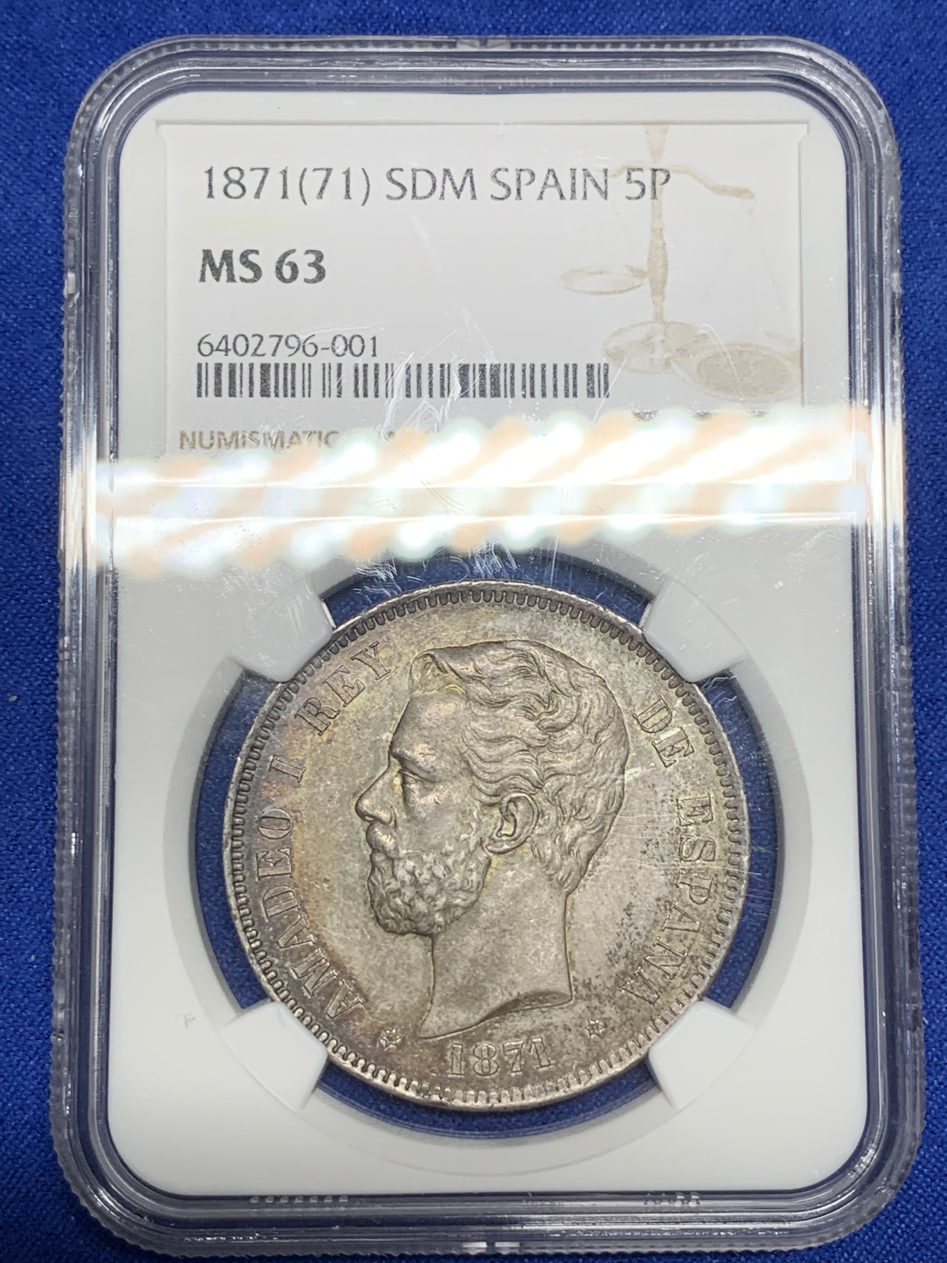 《竞宝斋》第194场-周日，周一 2场 (全场包邮) NGC-MS63 西班牙 1871年 阿马迪奥一世 5比塞塔双柱银币，难得高分，正反深五彩包浆，均匀且自然，稀缺品种高分难觅