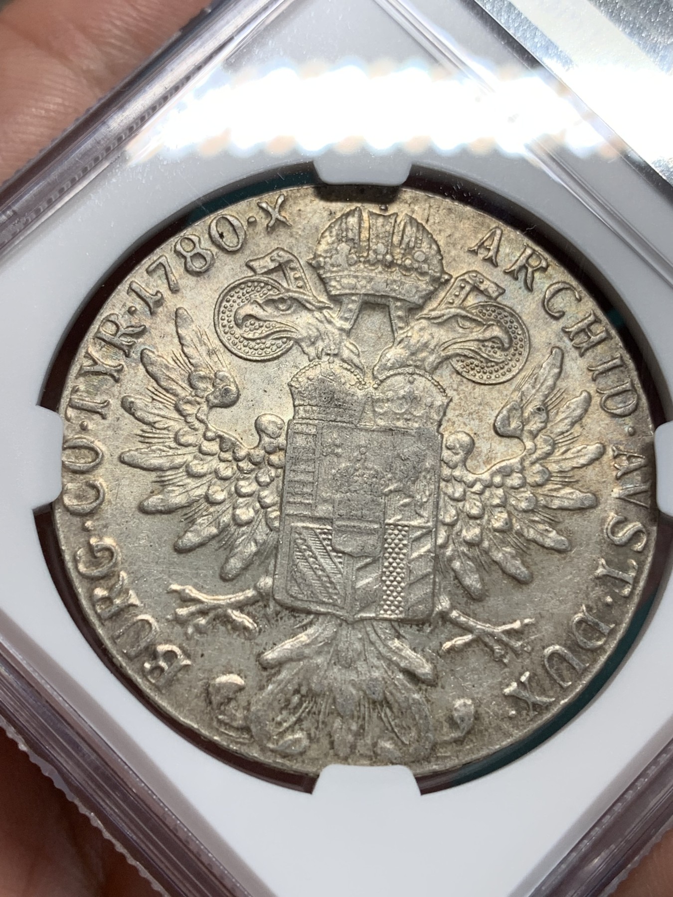 《竞宝斋》第194场-周日，周一 2场 (全场包邮) NGC-MS62 奥地利“1780”年 玛利亚.特蕾莎 1泰勒 大奶妈银币 早期后铸版本（伦敦版） 五彩转光 有点双须的样子 细节见图