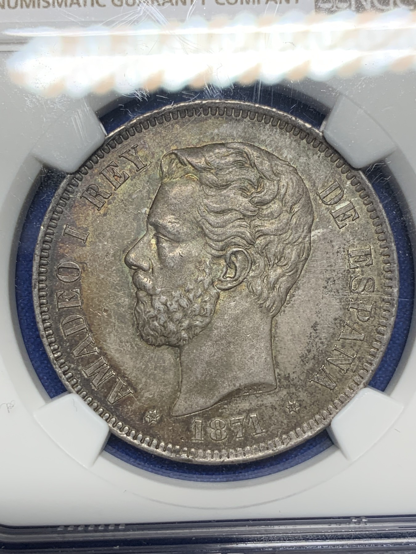 《竞宝斋》第194场-周日，周一 2场 (全场包邮) NGC-MS63 西班牙 1871年 阿马迪奥一世 5比塞塔双柱银币，难得高分，正反深五彩包浆，均匀且自然，稀缺品种高分难觅