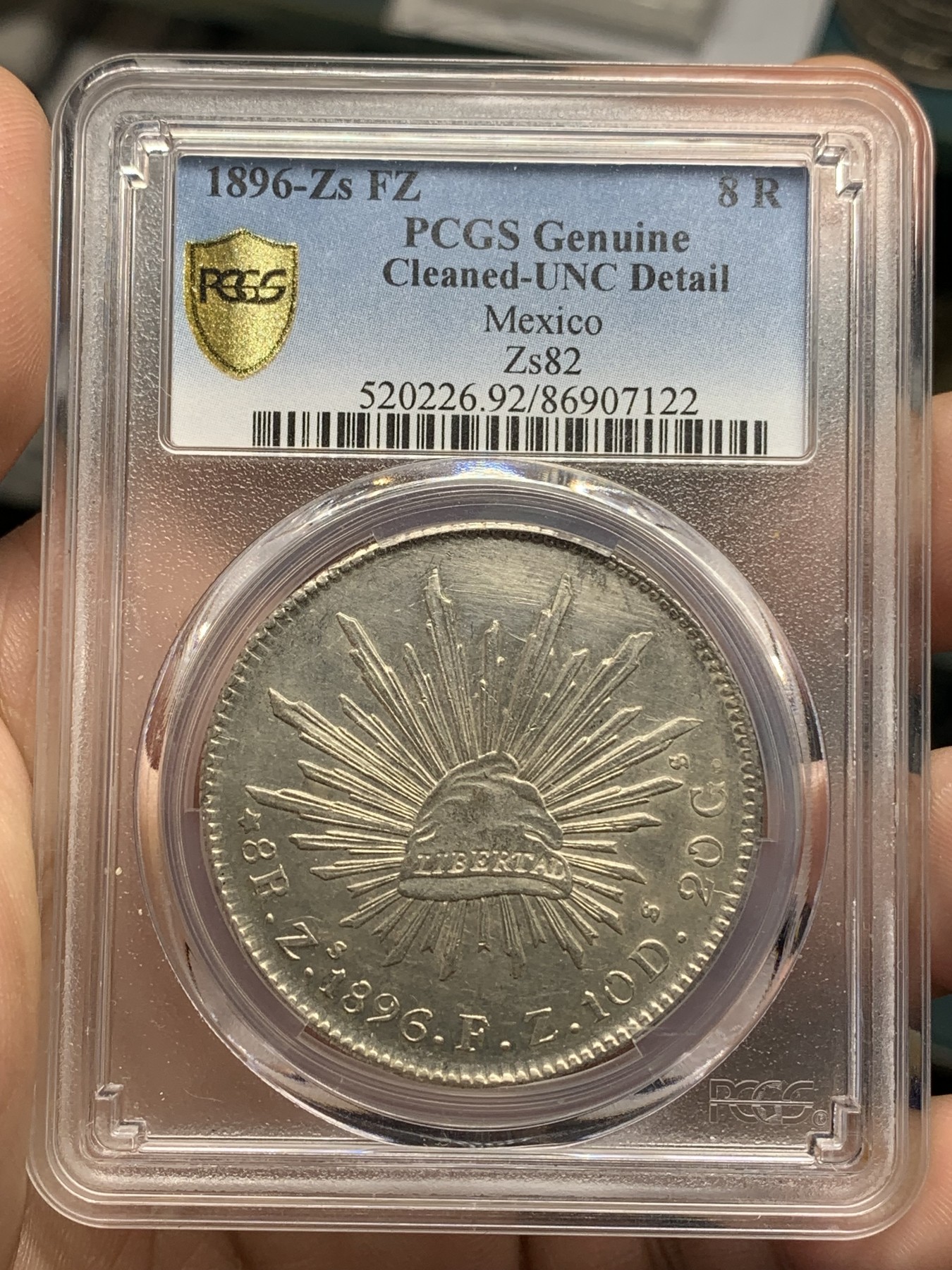 《竞宝斋》第194场-周日，周一 2场 (全场包邮) PCGS UNC 墨西哥 1896年 8瑞尔 花边鹰洋银币 全羽 状态不错