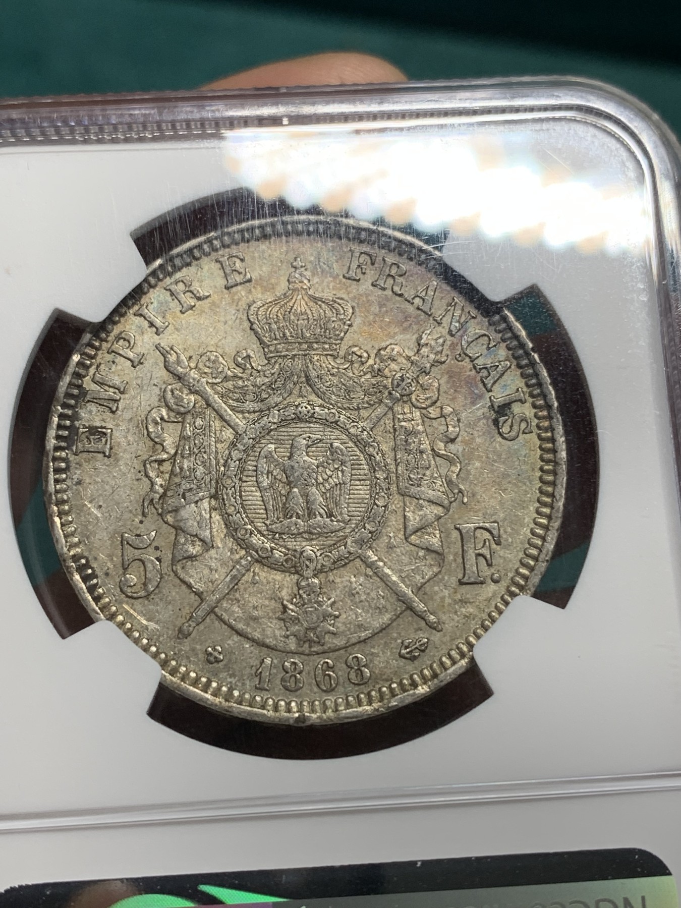 《竞宝斋》第194场-周日，周一 2场 (全场包邮) NGC AU53 法国1868年拿破仑三世5法郎银币 极品五彩 低评状态非常好 AU中的战斗机