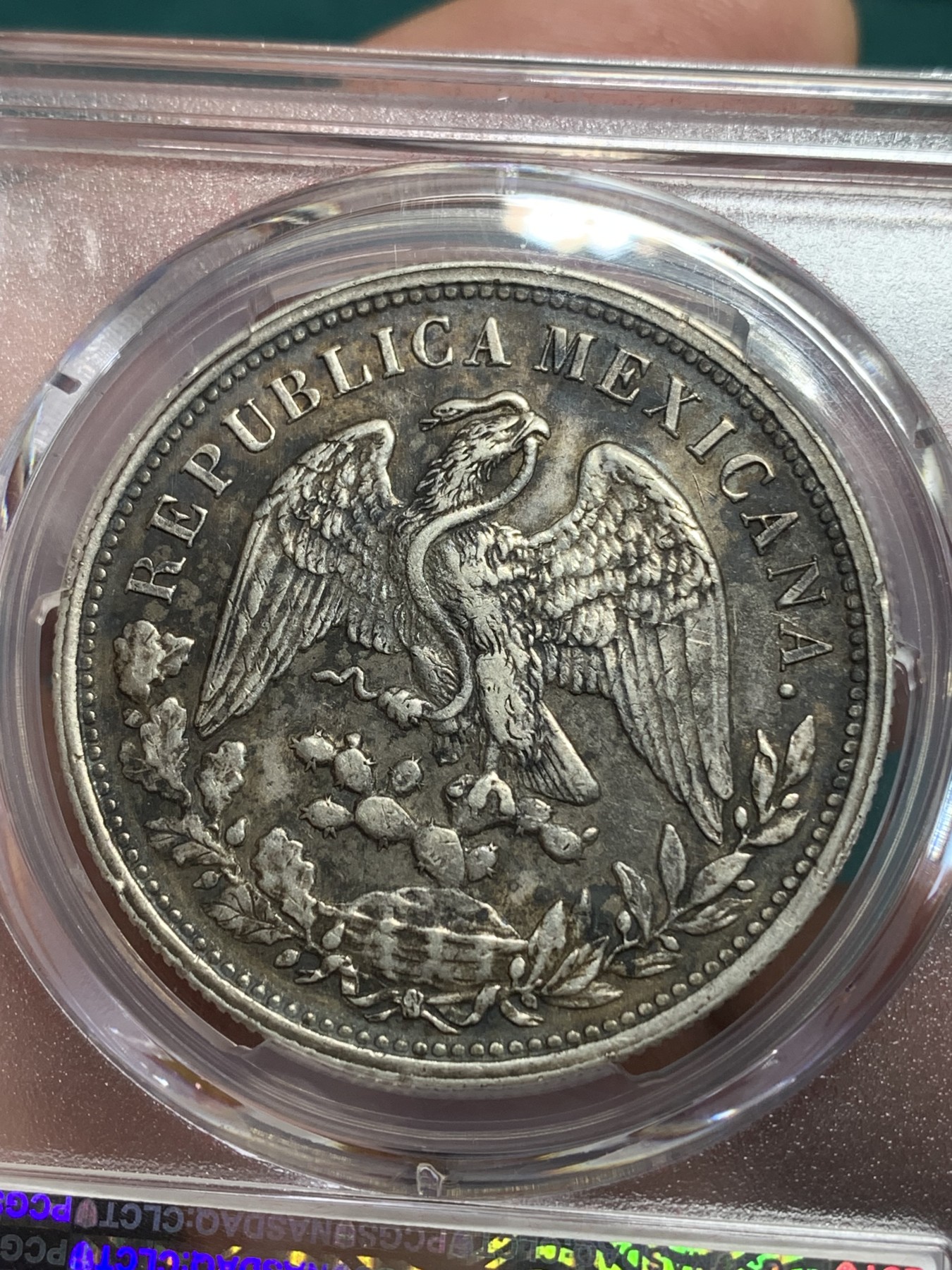 《竞宝斋》第194场-周日，周一 2场 (全场包邮) PCGS-AU50 墨西哥1898年鹰洋1比索银元  后铸版，五彩入骨包浆，压印清晰，味道极好
