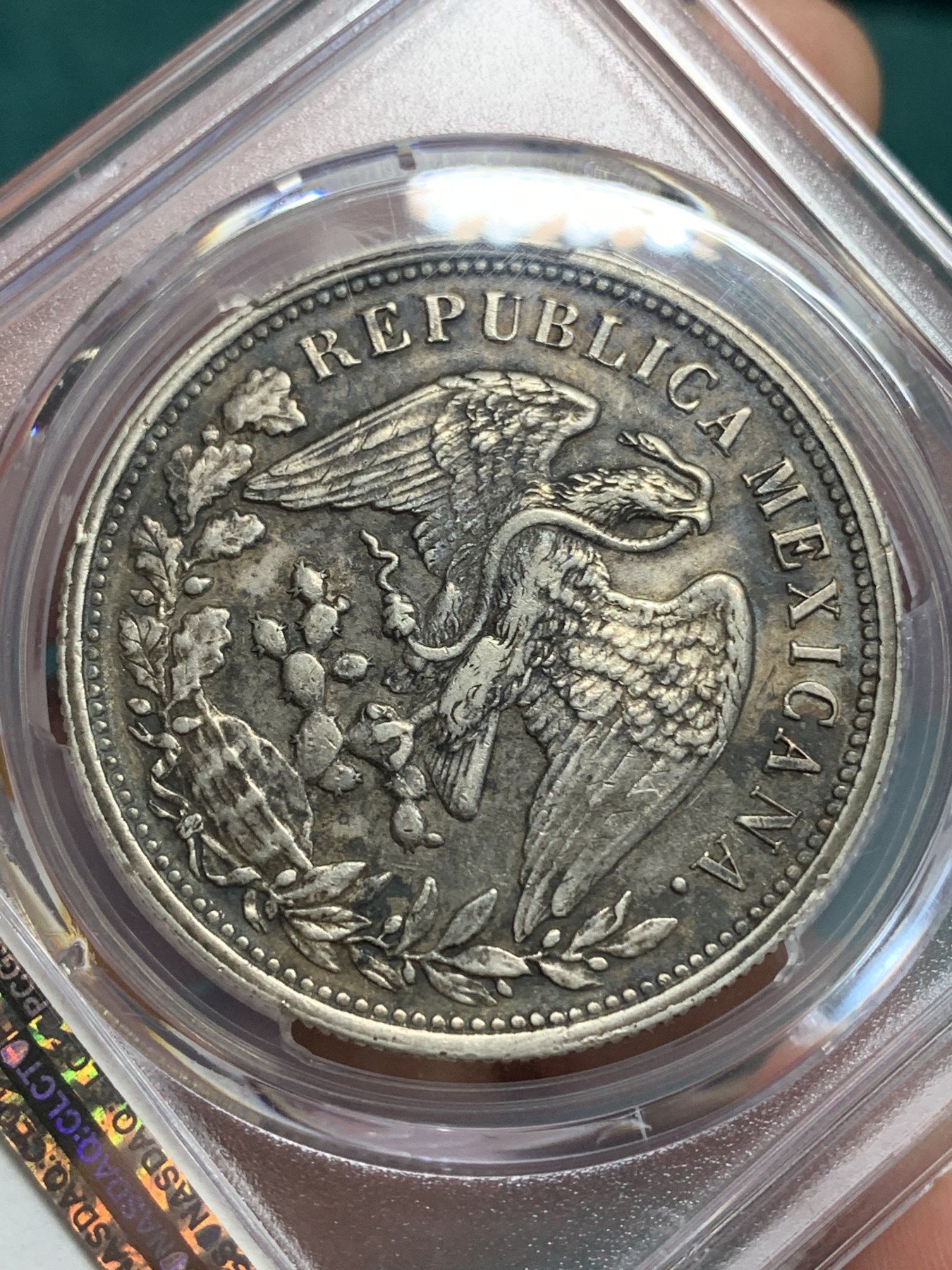 《竞宝斋》第194场-周日，周一 2场 (全场包邮) PCGS-AU50 墨西哥1898年鹰洋1比索银元  后铸版，五彩入骨包浆，压印清晰，味道极好