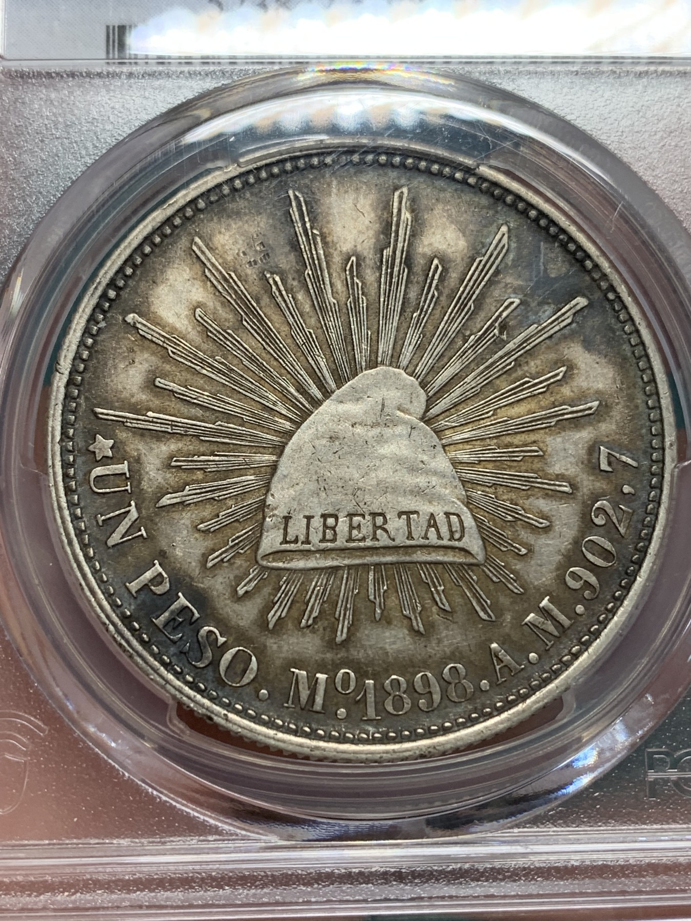 《竞宝斋》第194场-周日，周一 2场 (全场包邮) PCGS-AU50 墨西哥1898年鹰洋1比索银元  后铸版，五彩入骨包浆，压印清晰，味道极好