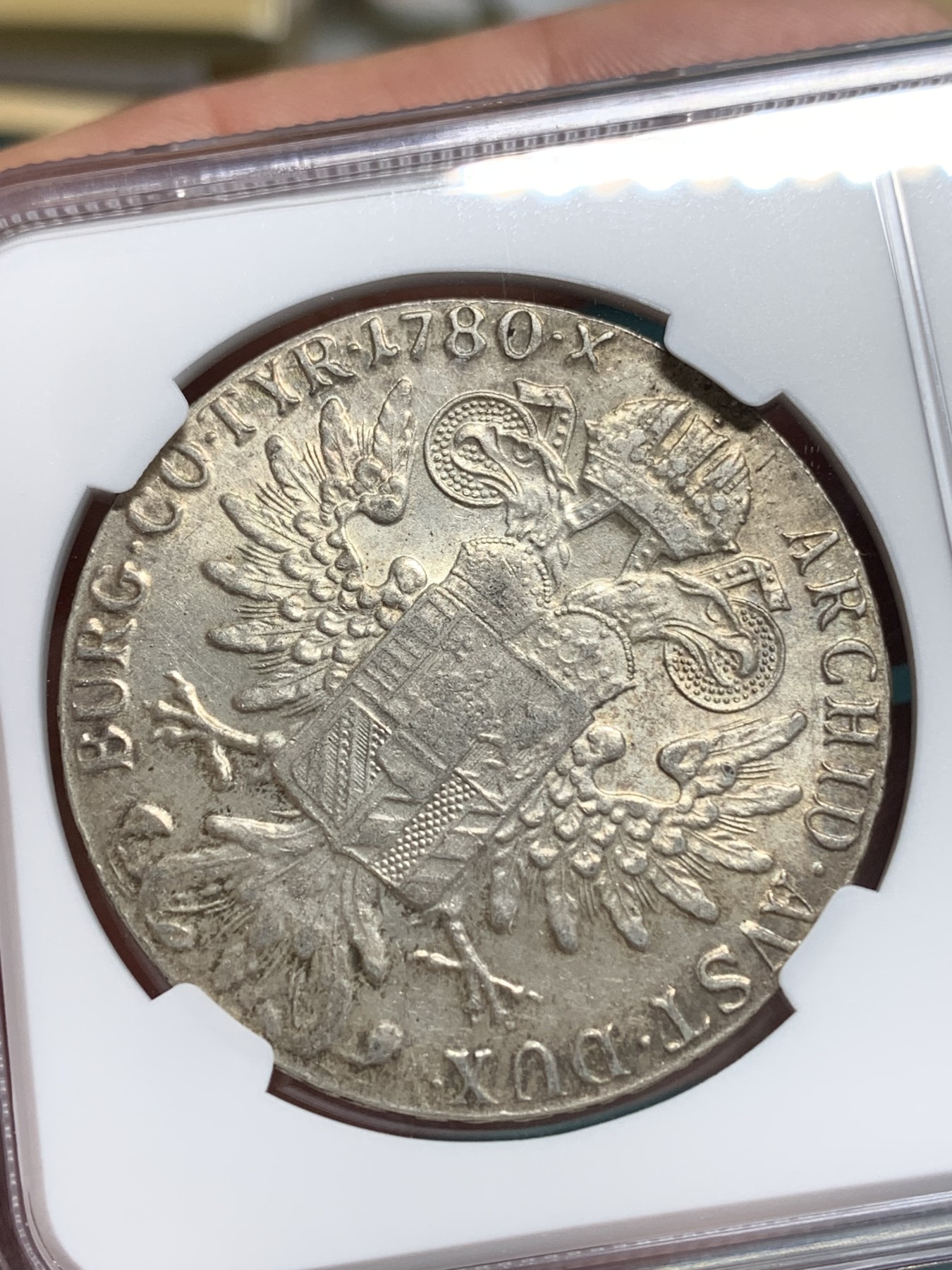 《竞宝斋》第194场-周日，周一 2场 (全场包邮) NGC-MS62 奥地利“1780”年 玛利亚.特蕾莎 1泰勒 大奶妈银币 早期后铸版本（伦敦版） 五彩转光 有点双须的样子 细节见图