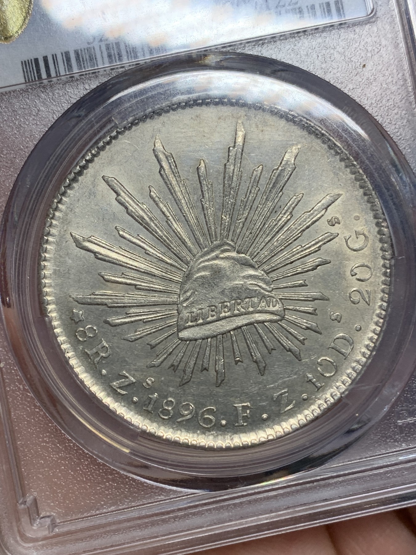 《竞宝斋》第194场-周日，周一 2场 (全场包邮) PCGS UNC 墨西哥 1896年 8瑞尔 花边鹰洋银币 全羽 状态不错