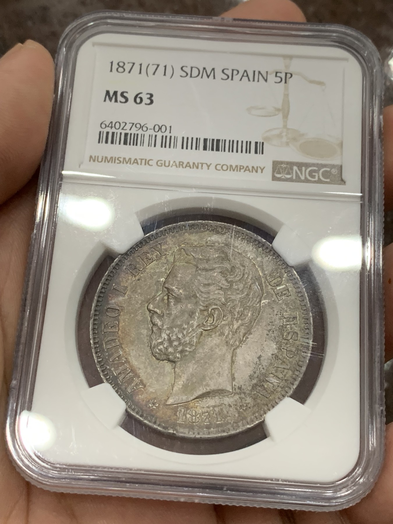 《竞宝斋》第194场-周日，周一 2场 (全场包邮) NGC-MS63 西班牙 1871年 阿马迪奥一世 5比塞塔双柱银币，难得高分，正反深五彩包浆，均匀且自然，稀缺品种高分难觅