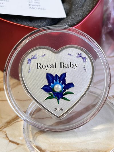 【海寕潮】拍卖第八十一期 - 【海寧潮A】帕劳2006年皇室宝宝镶嵌珍珠彩色心形纪念银币带盒证书淘宝售价7500