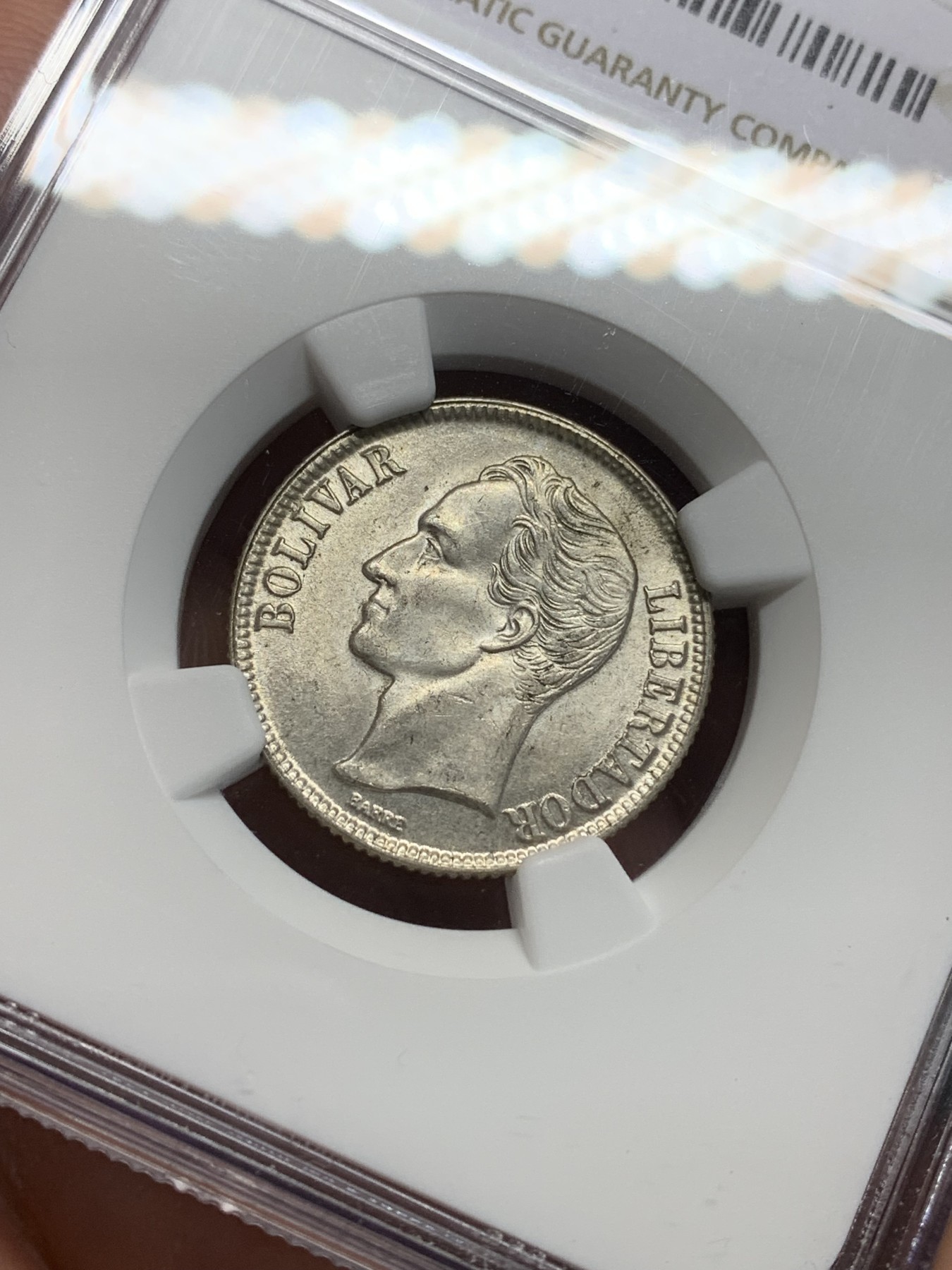 《竞宝斋》第195场-周日，周一 2场 (全场包邮) NGC-MS64 委内瑞拉1954年 1波利瓦尔银币 好品小辅币