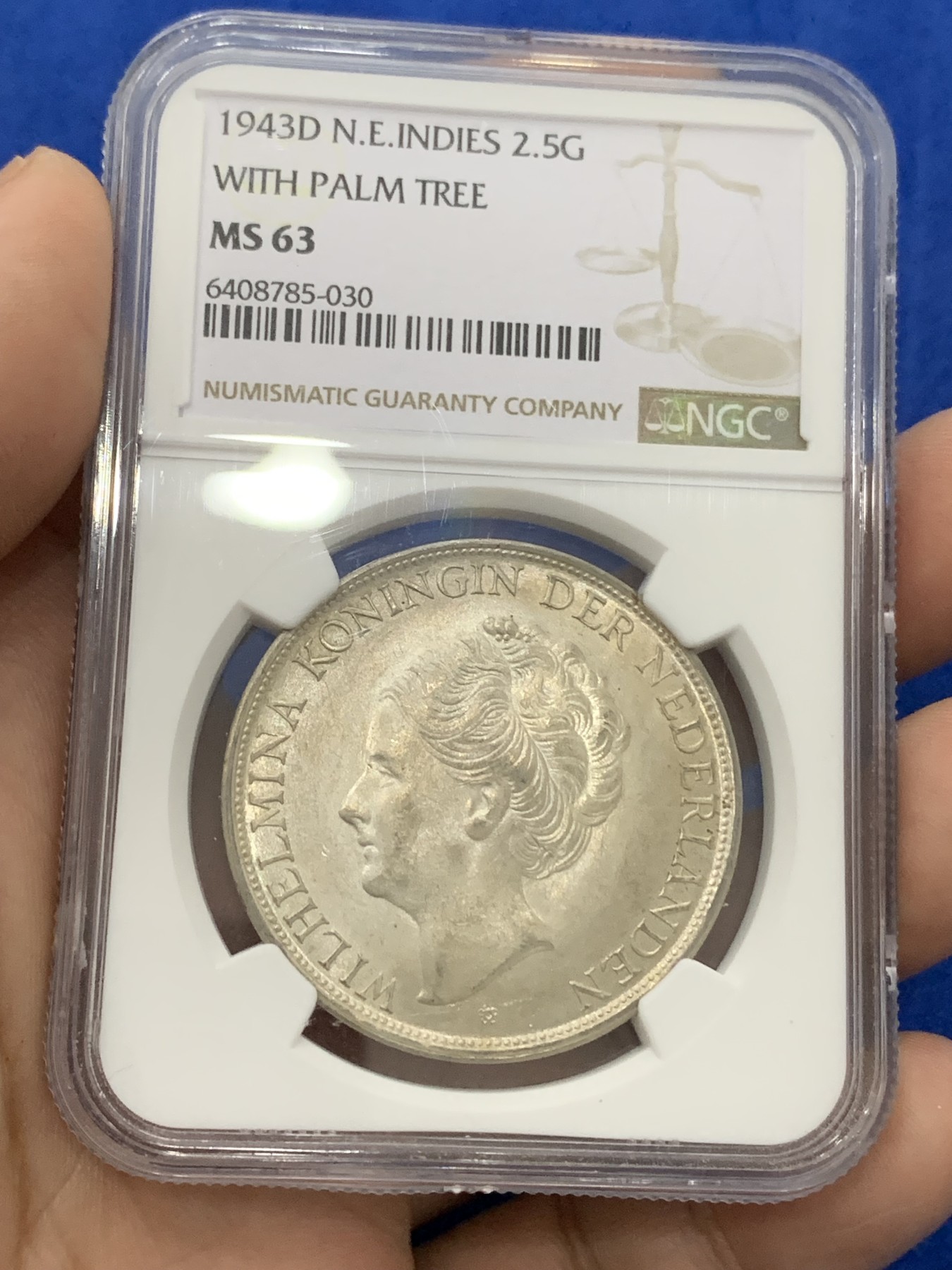 《竞宝斋》第195场-周日，周一 2场 (全场包邮) NGC-MS63 荷属东印度1943年威廉明娜女王2.5盾大银币 底板干净无附着物 殖民地稀少品种