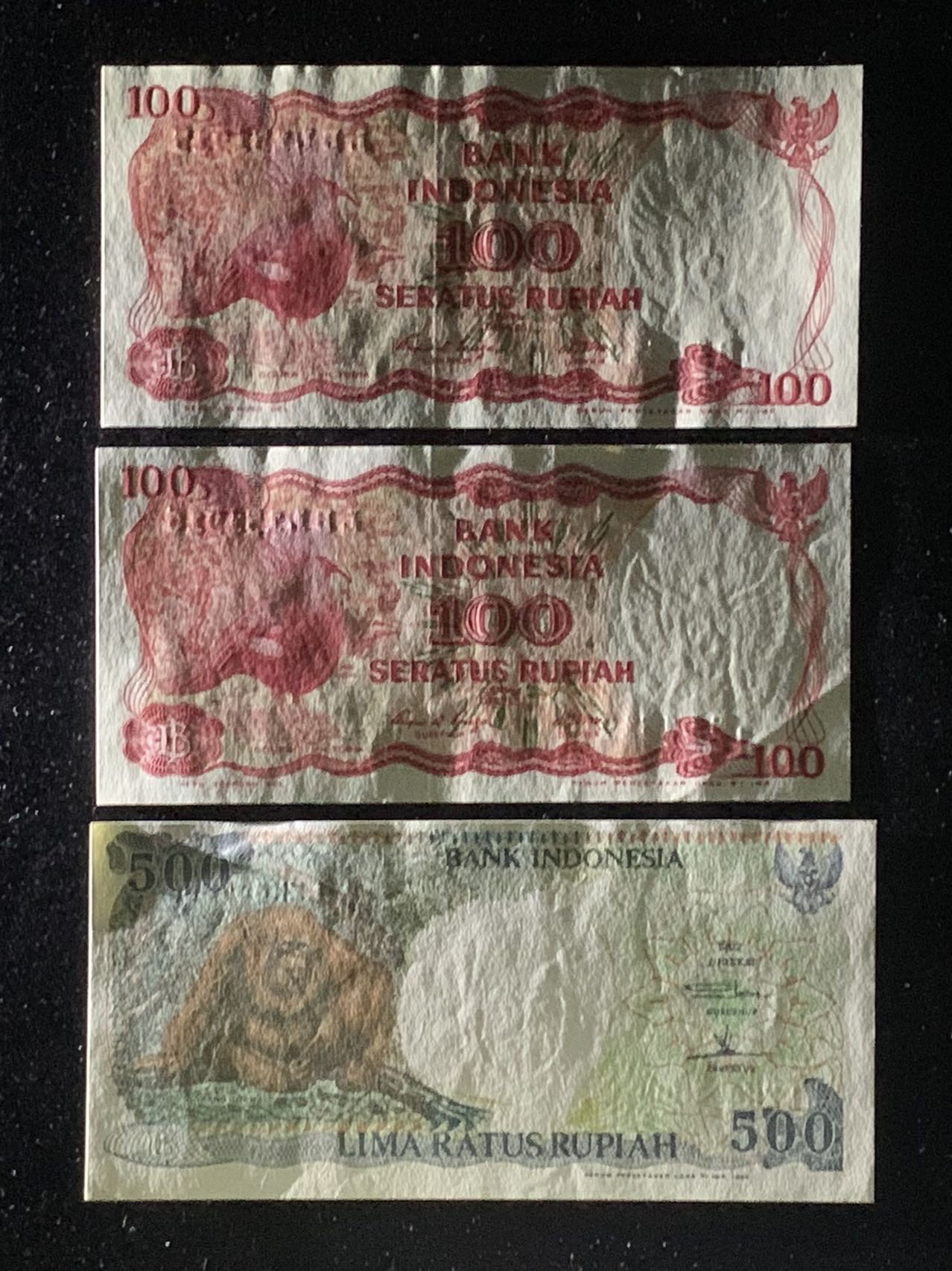 紫瑗钱币——第302期拍卖—纸币场 印度尼西亚 1984 1992年 鸟版 大猩猩 100 500卢比 3张一组 UNC-