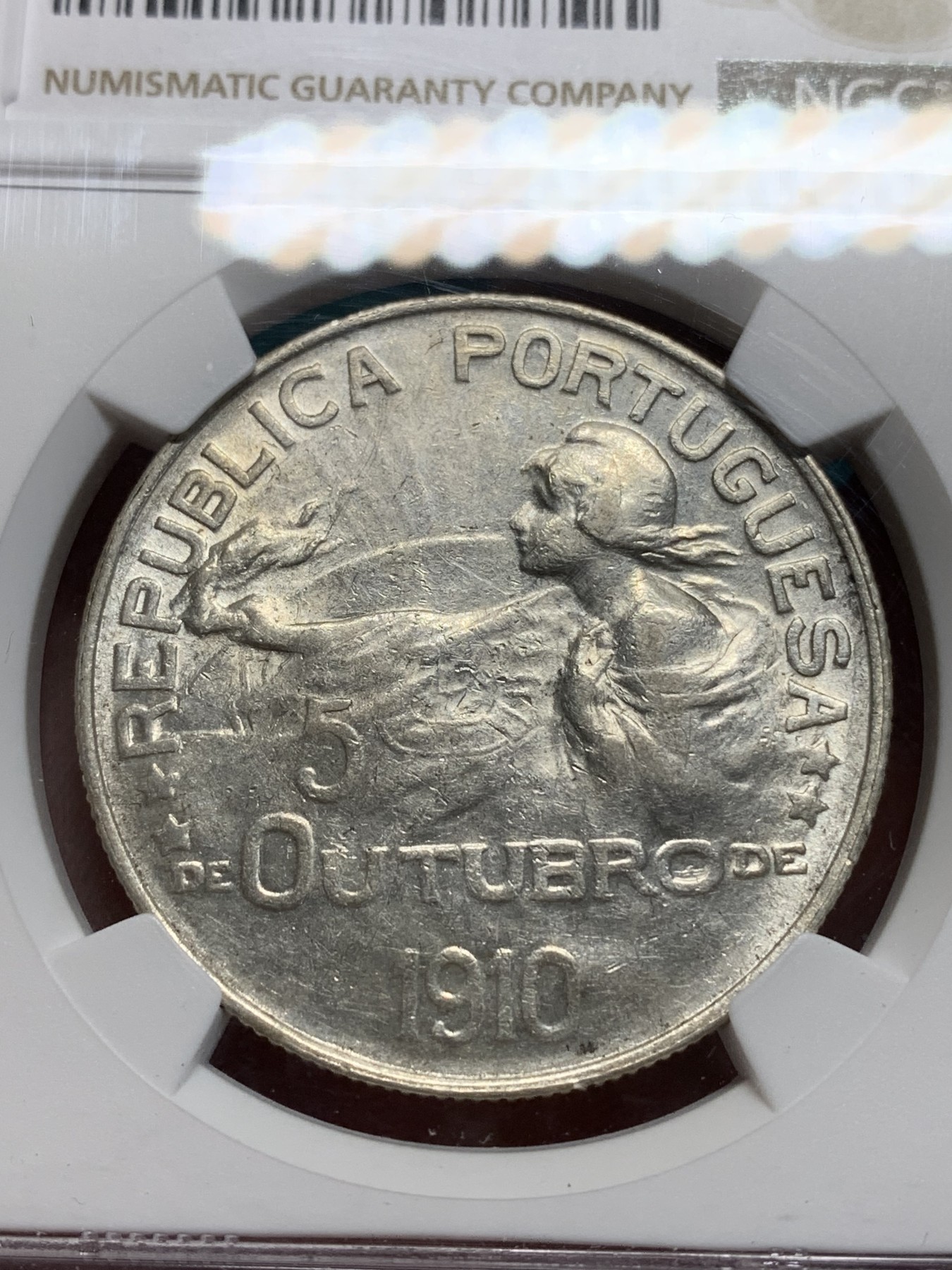 《竞宝斋》第195场-周日，周一 2场 (全场包邮) NGC AU55 葡萄牙1910年半岛战争女神头像 1埃斯库多大银币 稀少品种