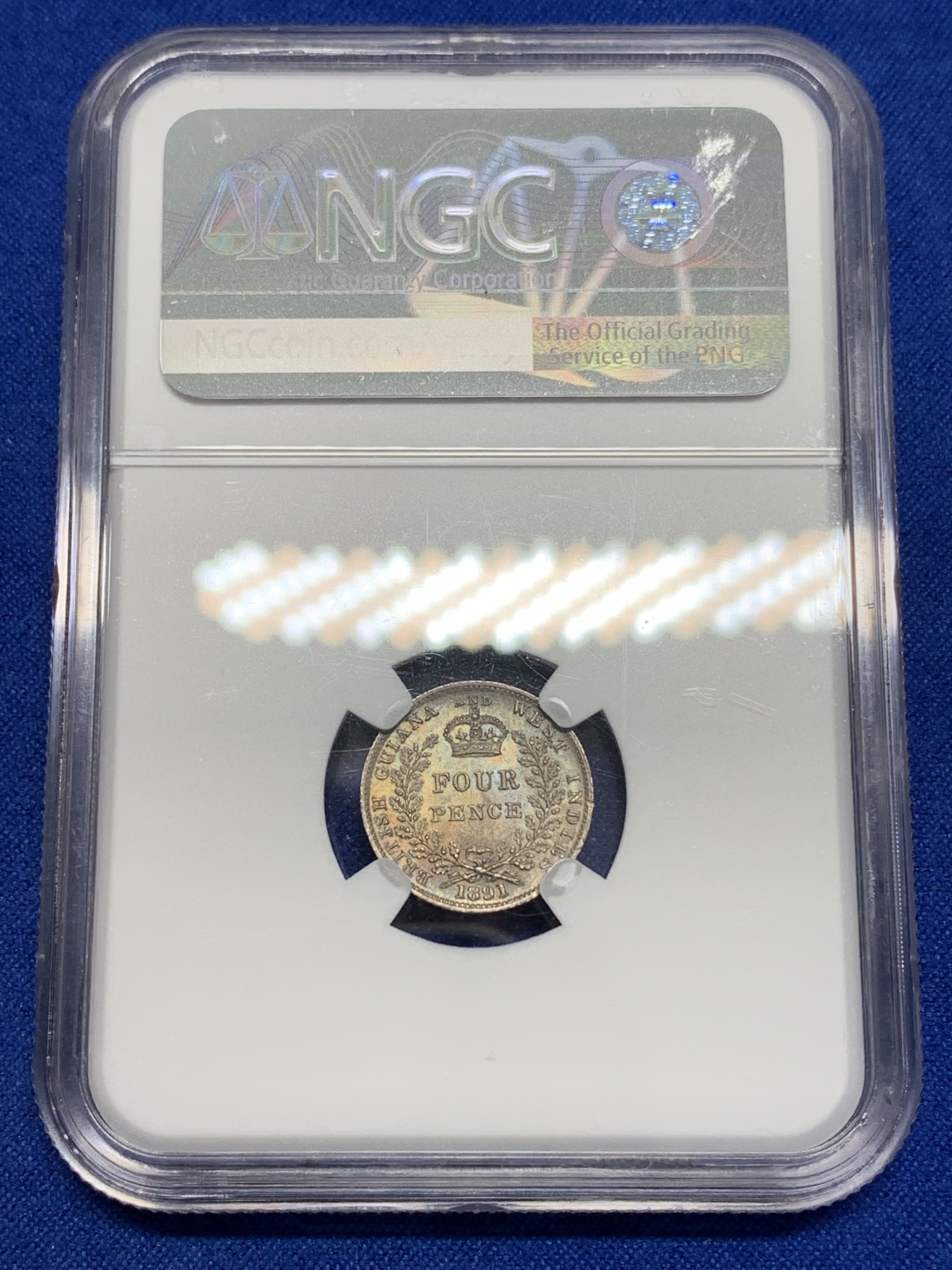 《竞宝斋》第195场-周日，周一 2场 (全场包邮) NGC-MS64 英属圭亚那 1891年 维多利亚女王4便士银币 币面五彩包浆