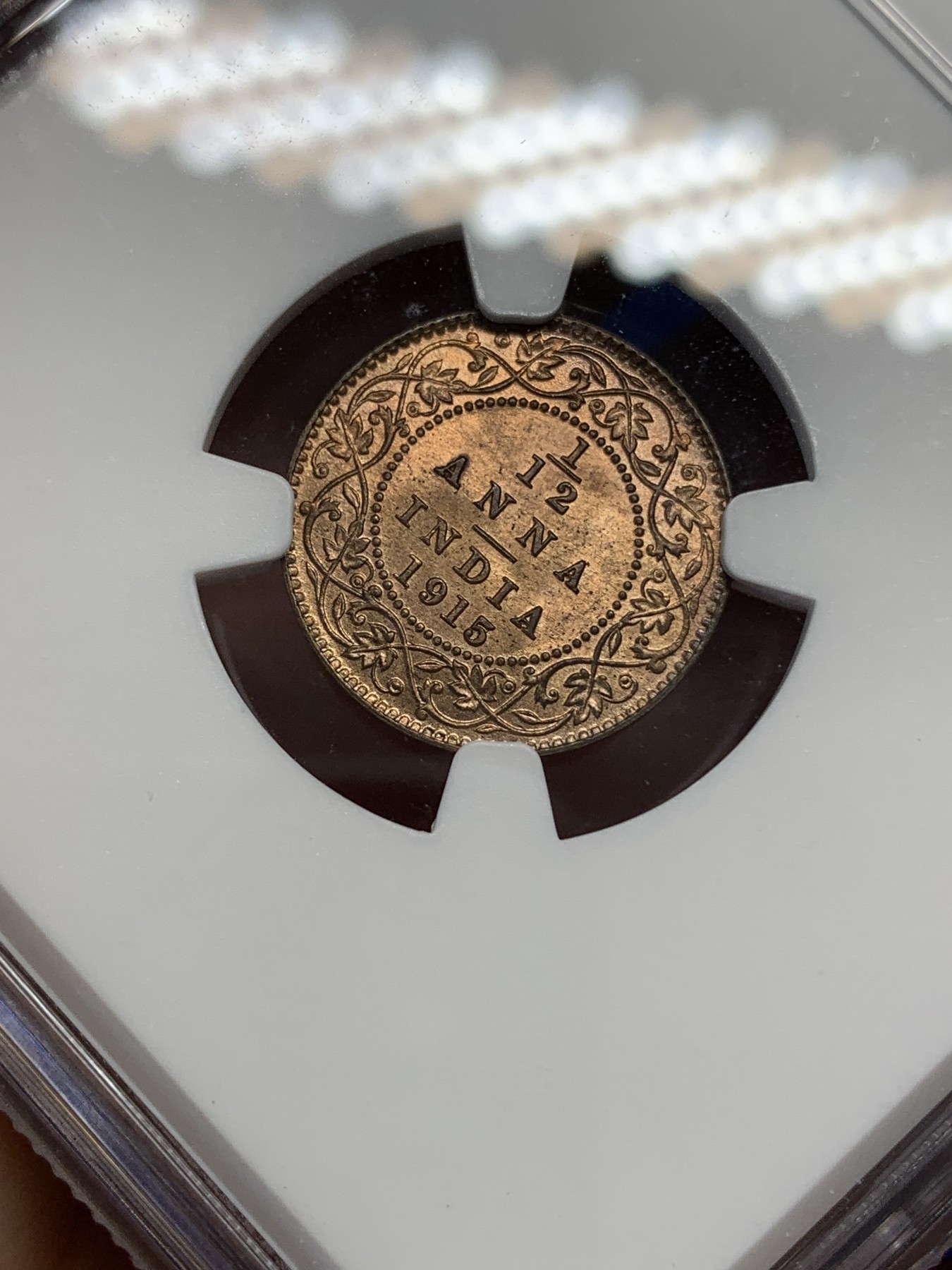 《竞宝斋》第195场-周日，周一 2场 (全场包邮) 两枚一组 NGC-MS64英属印度乔五1/12安娜铜币+NGC-MS62英属南非女王1便士铜币 光度好低评