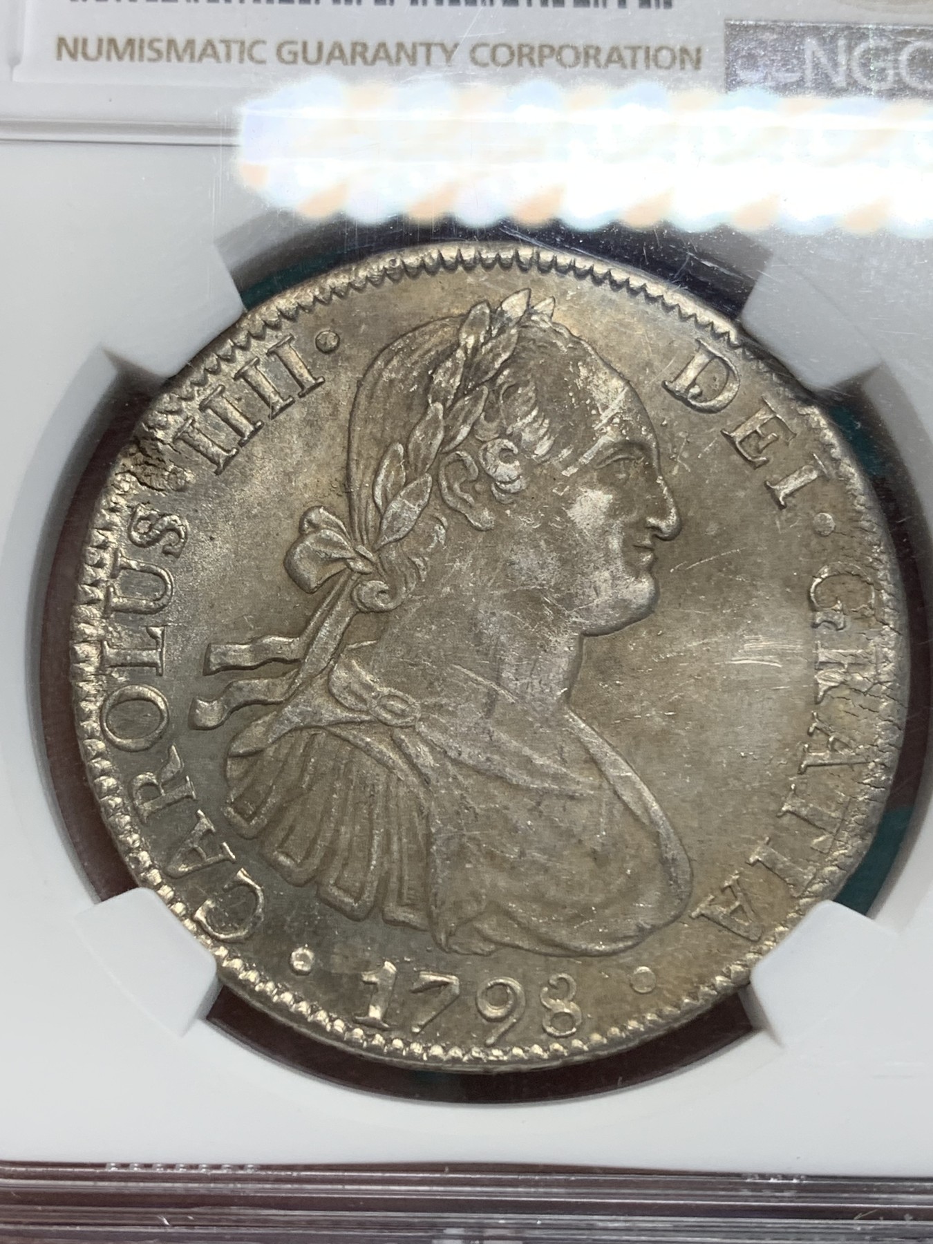 《竞宝斋》第195场-周日，周一 2场 (全场包邮) NGC UNC 西属墨西哥 1798 MO FM 人像双柱 卡四 8瑞尔大银币