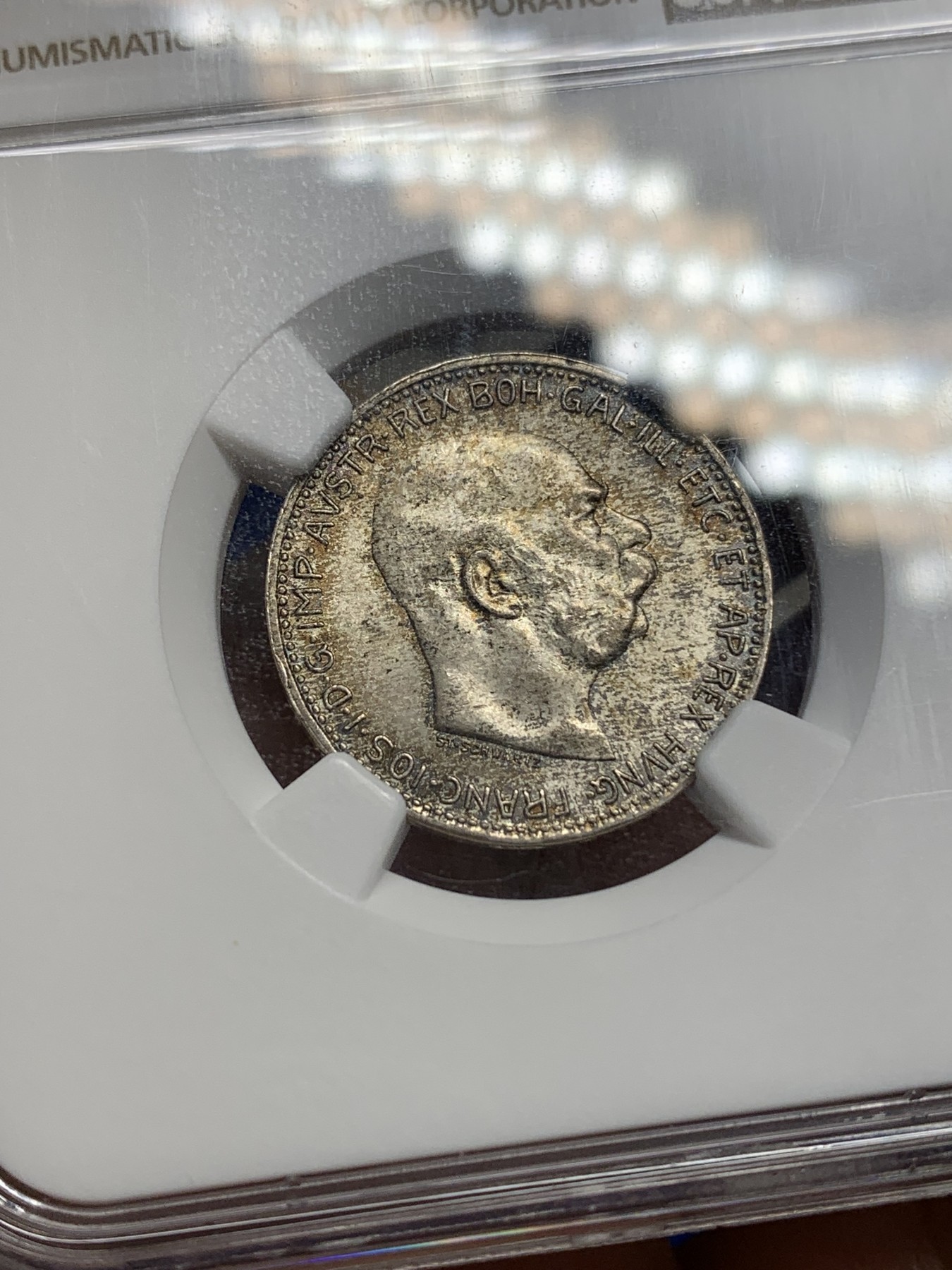 《竞宝斋》第195场-周日，周一 2场 (全场包邮) NGC-MS65 奥地利 1915年 1克朗 科罗娜 银币 黄油彩 少见高分