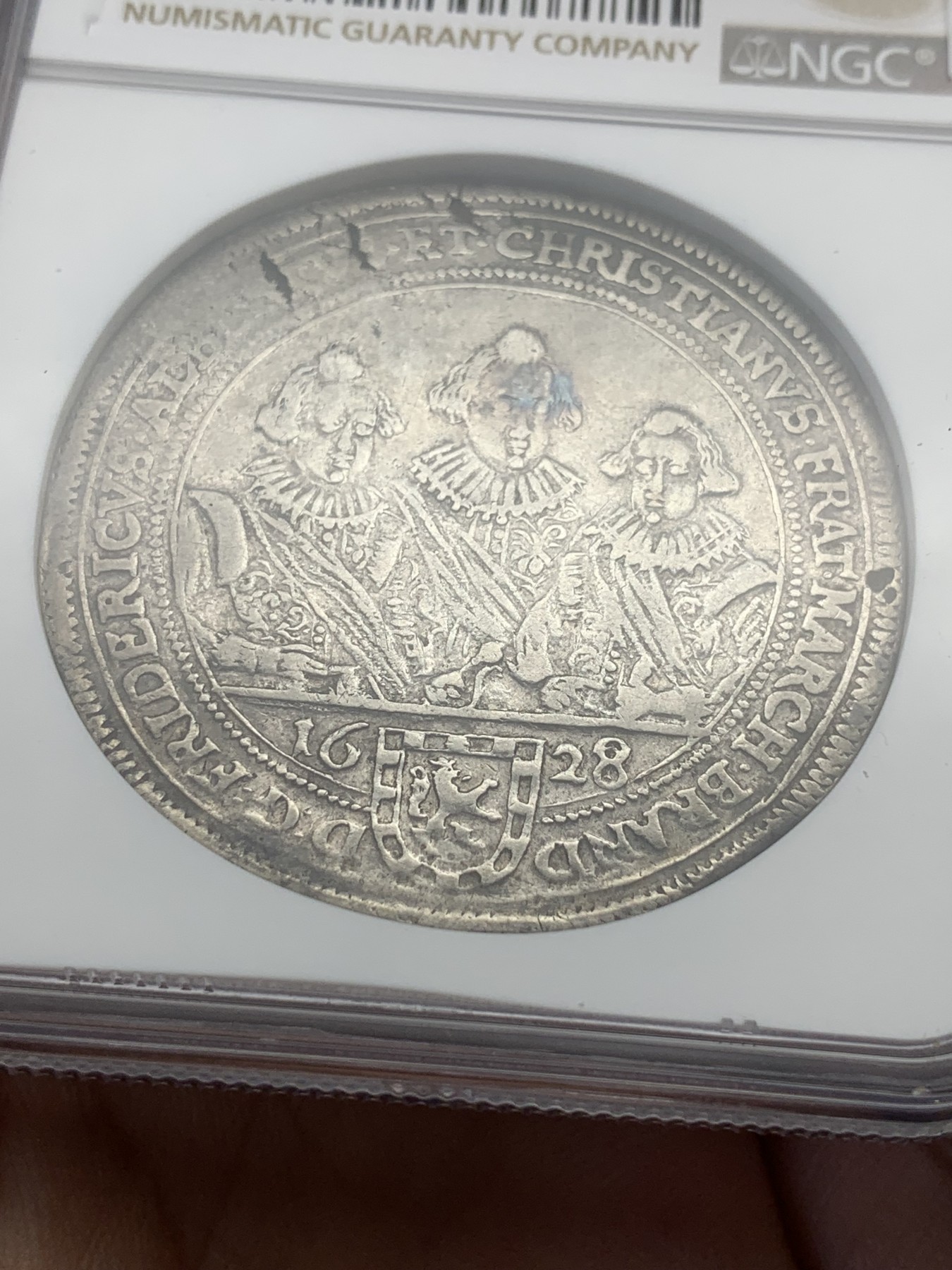 《竞宝斋》第195场-周日，周一 2场 (全场包邮) NGC AU50 1628/7骑字版  德国勃兰登堡 泰勒银币 非常难得品种 见到的基本为VFD状态 这枚NGC亚军（入盒仅2枚）这个时期萨克森居多