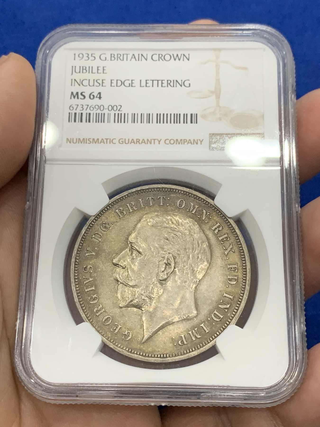 《竞宝斋》第195场-周日，周一 2场 (全场包邮) NGC- MS64 英国1935年乔治五世木马剑银币，彩不遮光，木马剑五彩罕见。