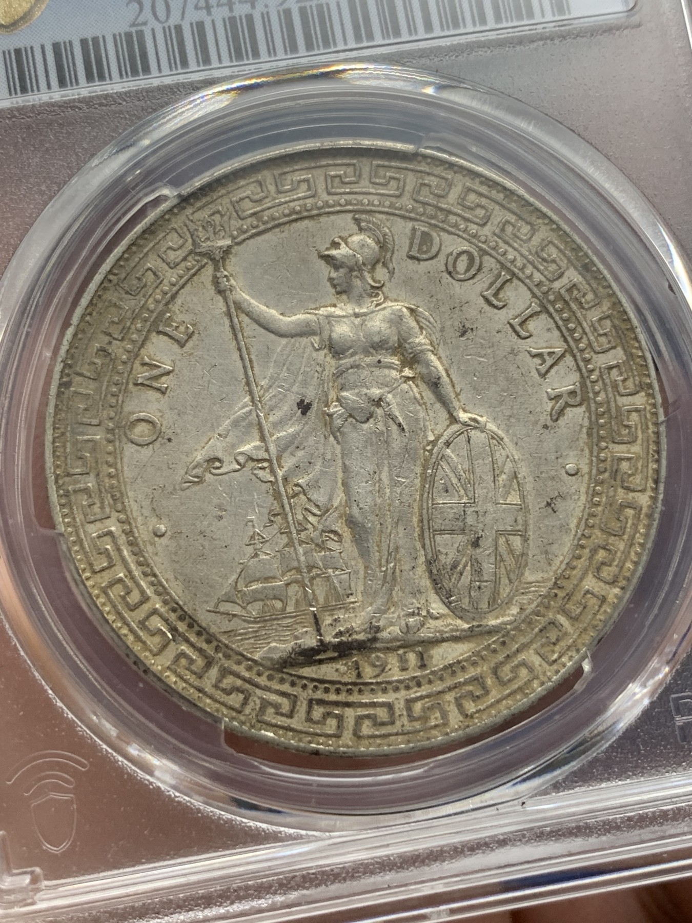 《竞宝斋》第195场-周日，周一 2场 (全场包邮) PCGS  XF  英国1911年站洋贸易银币   原味未清洗