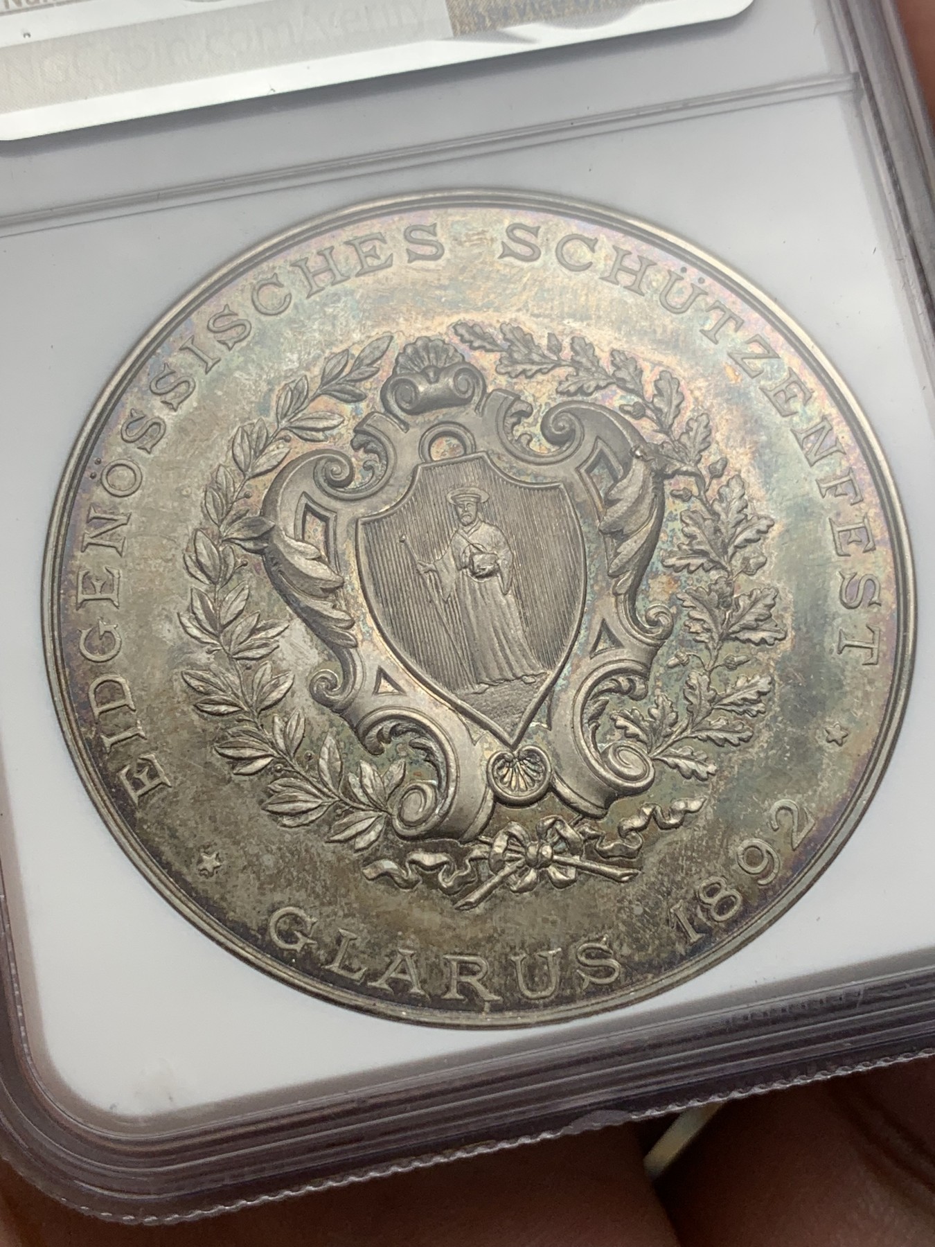 《竞宝斋》第195场-周日，周一 2场 (全场包邮) NGC-MS63 1892 瑞士 格拉鲁斯 大规格 深浮雕射击节 银章PL 五彩底板