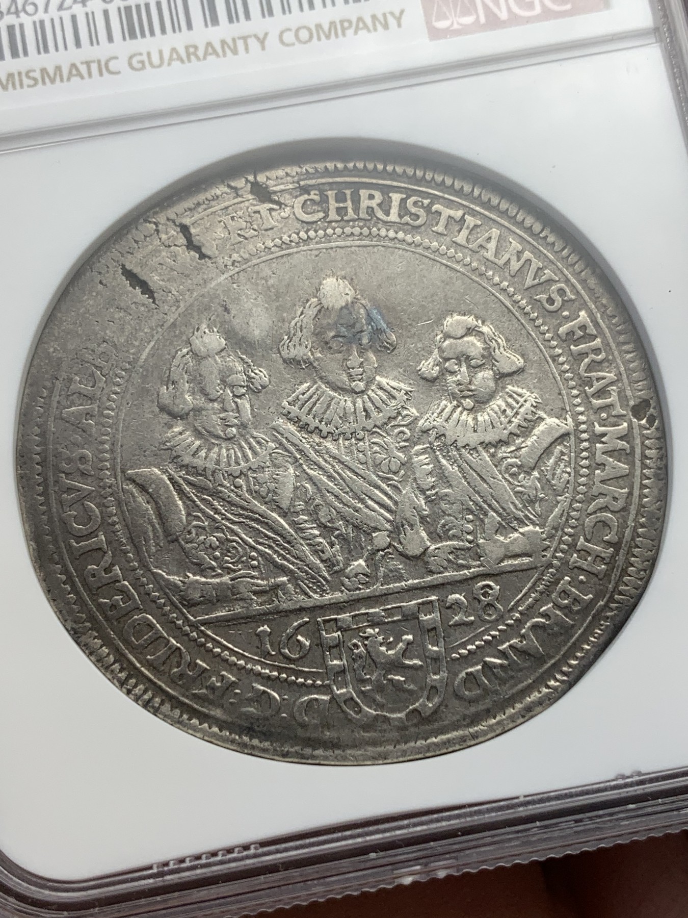 《竞宝斋》第195场-周日，周一 2场 (全场包邮) NGC AU50 1628/7骑字版  德国勃兰登堡 泰勒银币 非常难得品种 见到的基本为VFD状态 这枚NGC亚军（入盒仅2枚）这个时期萨克森居多