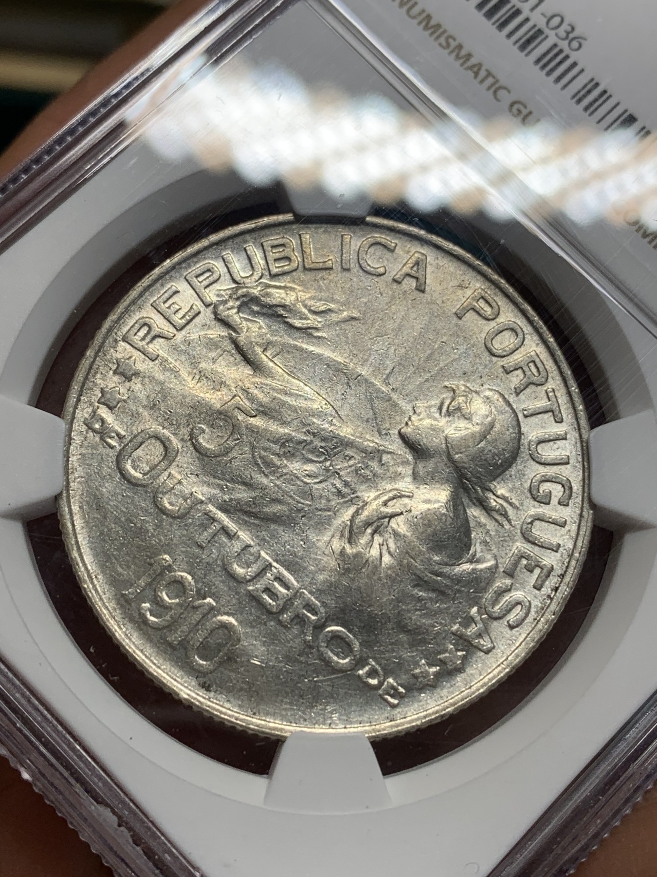 《竞宝斋》第195场-周日，周一 2场 (全场包邮) NGC AU55 葡萄牙1910年半岛战争女神头像 1埃斯库多大银币 稀少品种