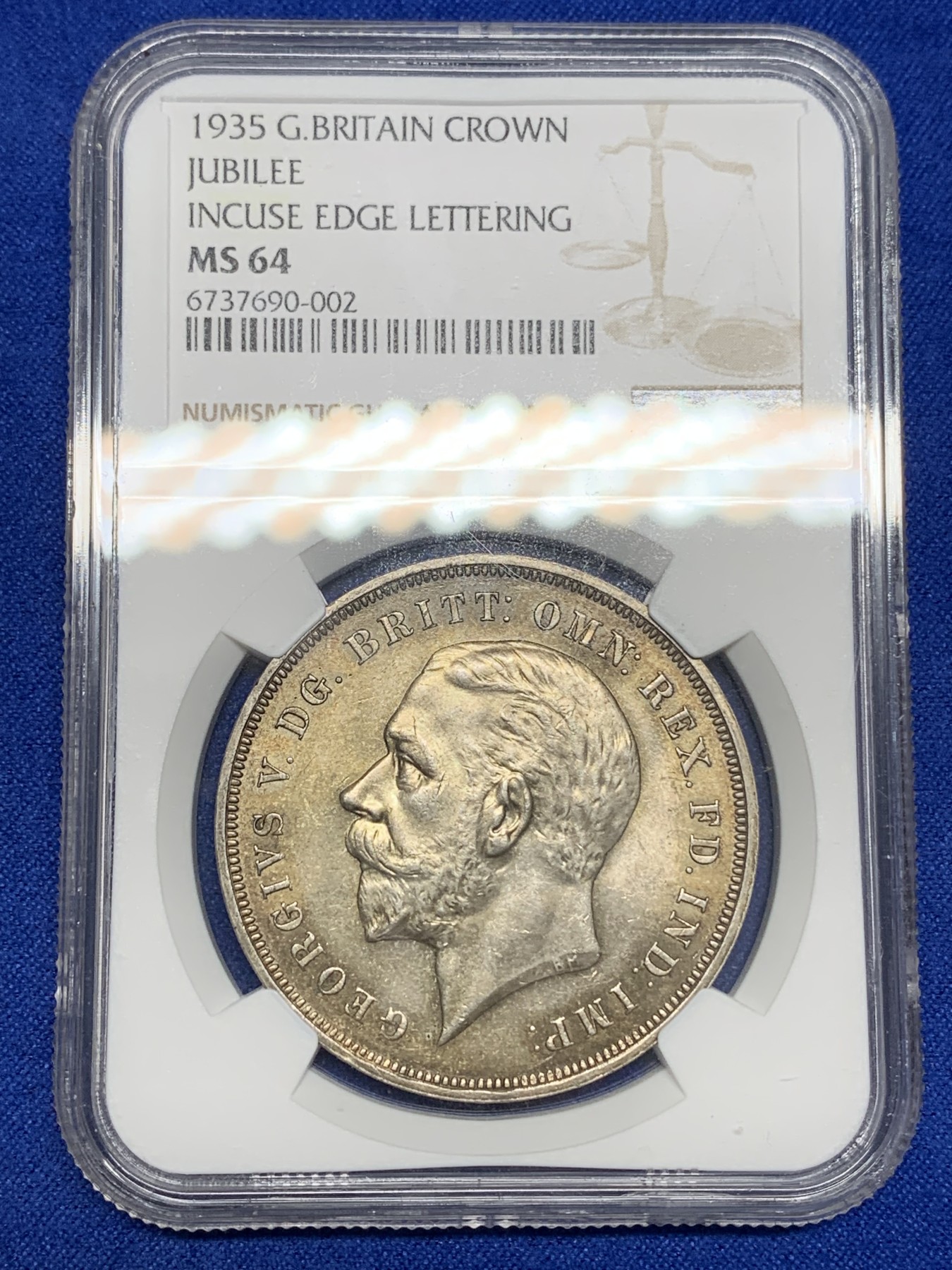 《竞宝斋》第195场-周日，周一 2场 (全场包邮) NGC- MS64 英国1935年乔治五世木马剑银币，彩不遮光，木马剑五彩罕见。