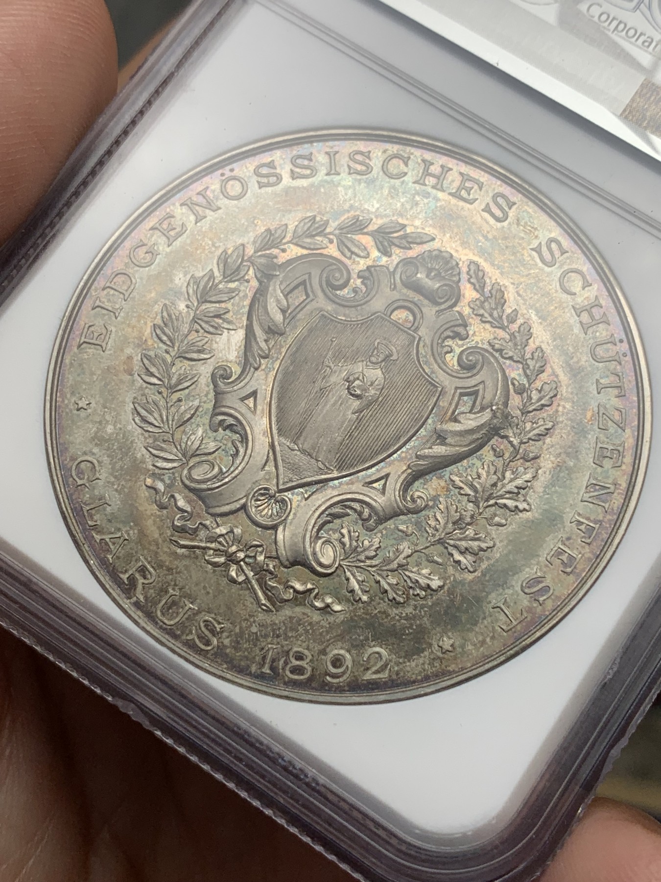 《竞宝斋》第195场-周日，周一 2场 (全场包邮) NGC-MS63 1892 瑞士 格拉鲁斯 大规格 深浮雕射击节 银章PL 五彩底板