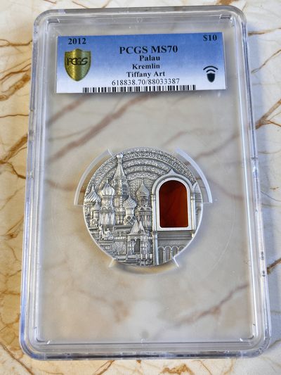 【海寕潮】拍卖第八十一期 - 【海寧潮A】帕劳2012年镶琥珀建筑系列克林姆林宫2盎司银币PCGS-MS70评级盒碎带证书，可以打开，具体请看图，淘宝售价3000多