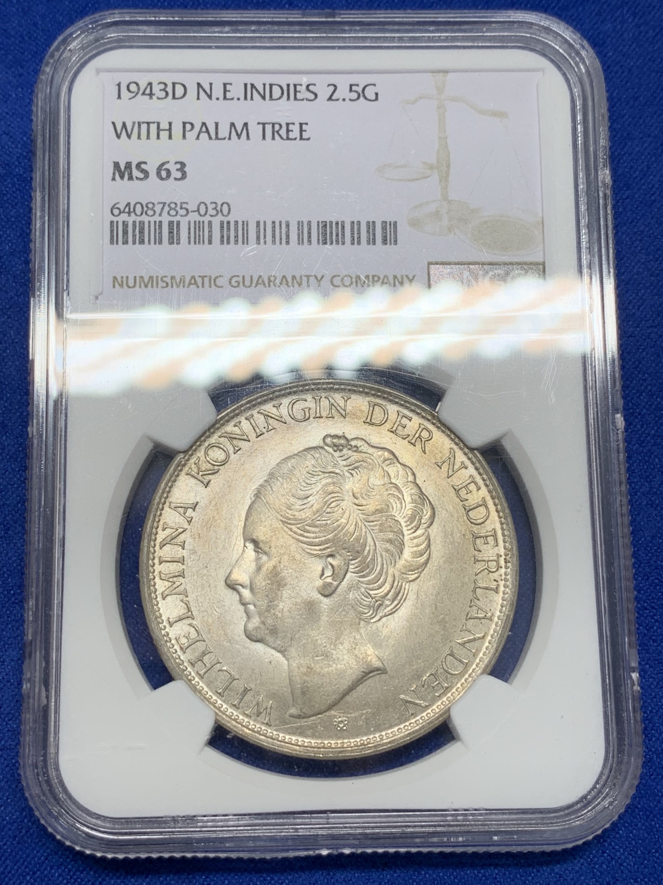 《竞宝斋》第195场-周日，周一 2场 (全场包邮) NGC-MS63 荷属东印度1943年威廉明娜女王2.5盾大银币 底板干净无附着物 殖民地稀少品种