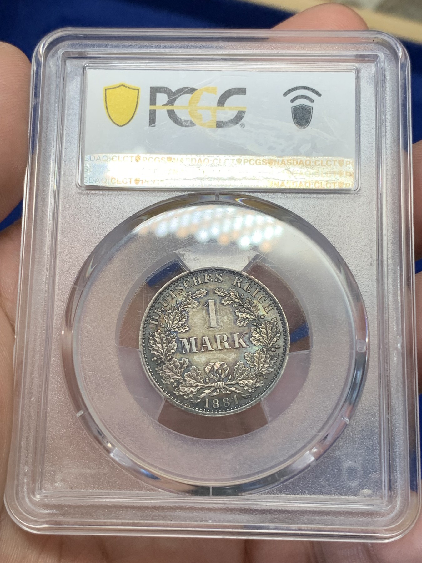 《竞宝斋》第195场-周日，周一 2场 (全场包邮) PCGS-MS63 德国1881年短翅鹰1马克银币，早期短翅帝国马克，原味黑彩，状态极佳。