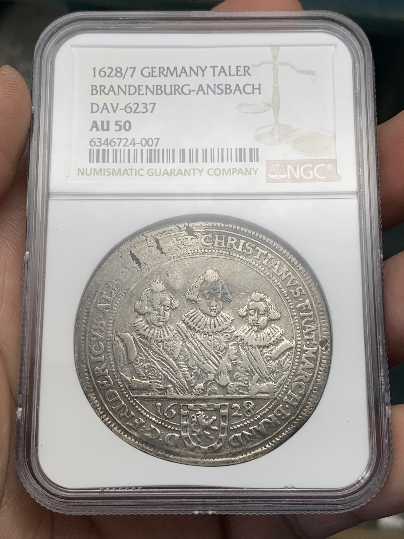 《竞宝斋》第195场-周日，周一 2场 (全场包邮) NGC AU50 1628/7骑字版  德国勃兰登堡 泰勒银币 非常难得品种 见到的基本为VFD状态 这枚NGC亚军（入盒仅2枚）这个时期萨克森居多