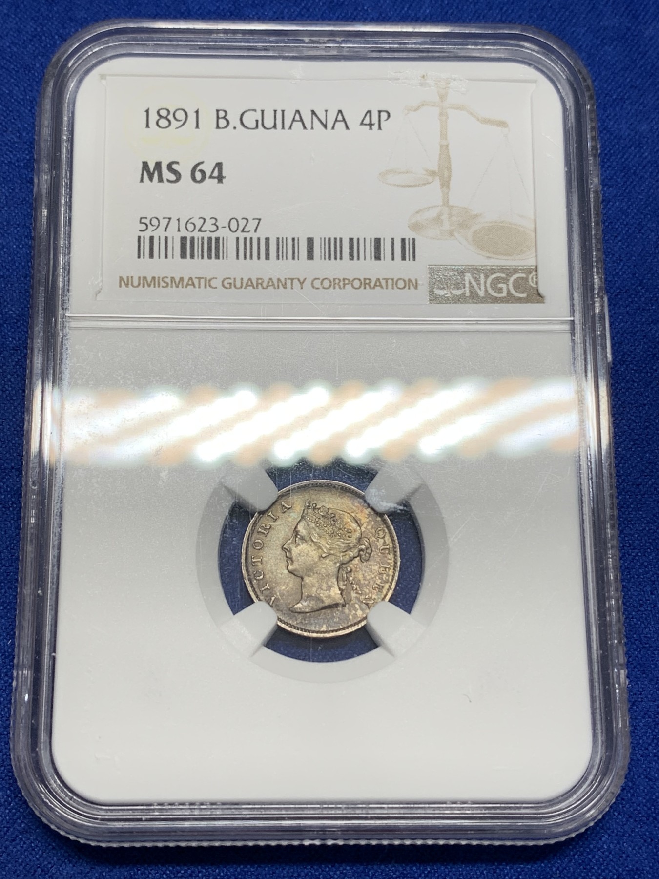 《竞宝斋》第195场-周日，周一 2场 (全场包邮) NGC-MS64 英属圭亚那 1891年 维多利亚女王4便士银币 币面五彩包浆