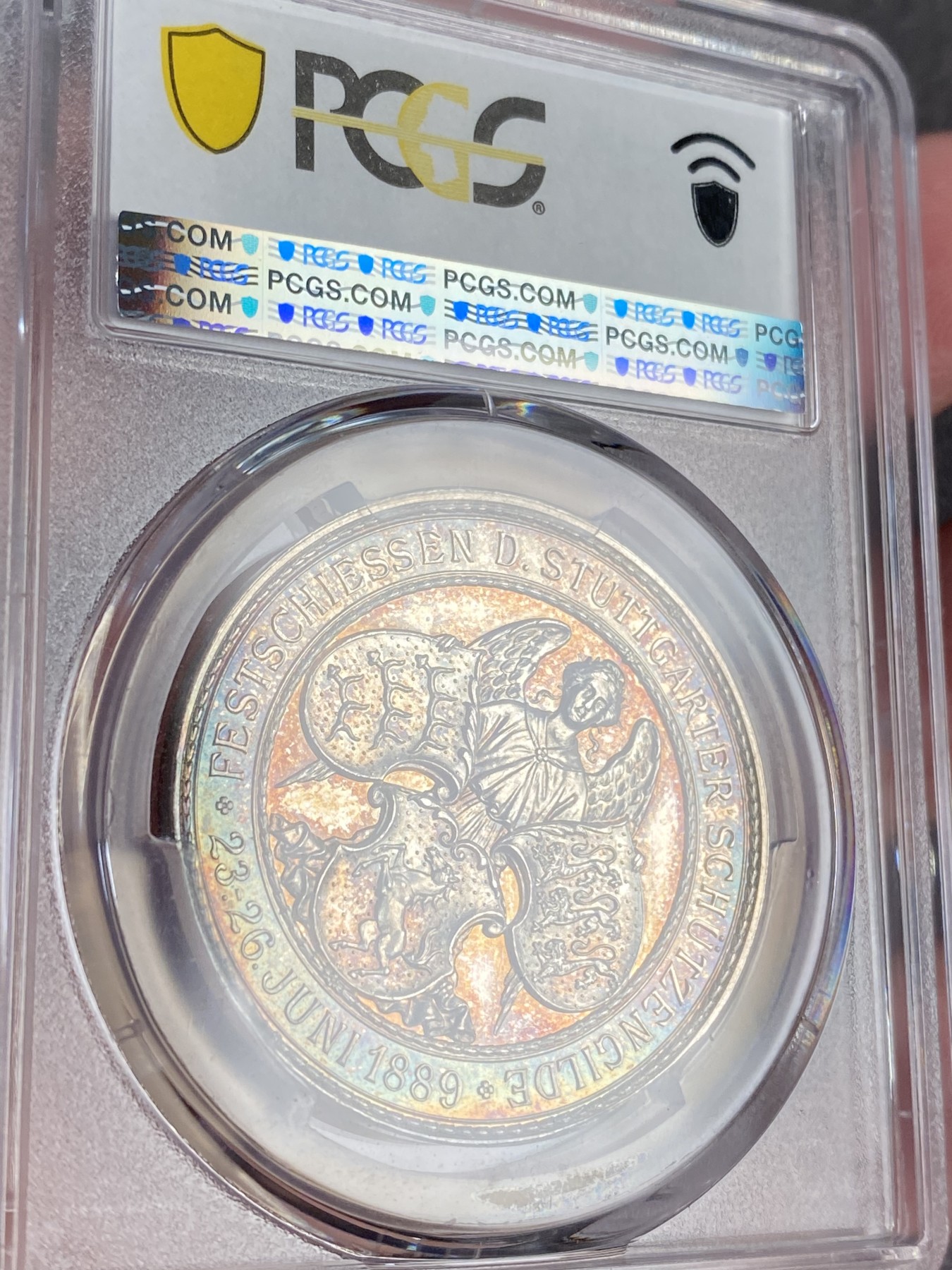 万国钱币拍卖第016期（奢华币章最终章） PCGS SP62 1889年德国符腾堡斯图加特纪念卡尔国王加冕25周年暨联邦射击节大银章 此品种所见几乎统统带有吊环 品种唯一冠军分 通体炫彩高浮雕 36MM 23G