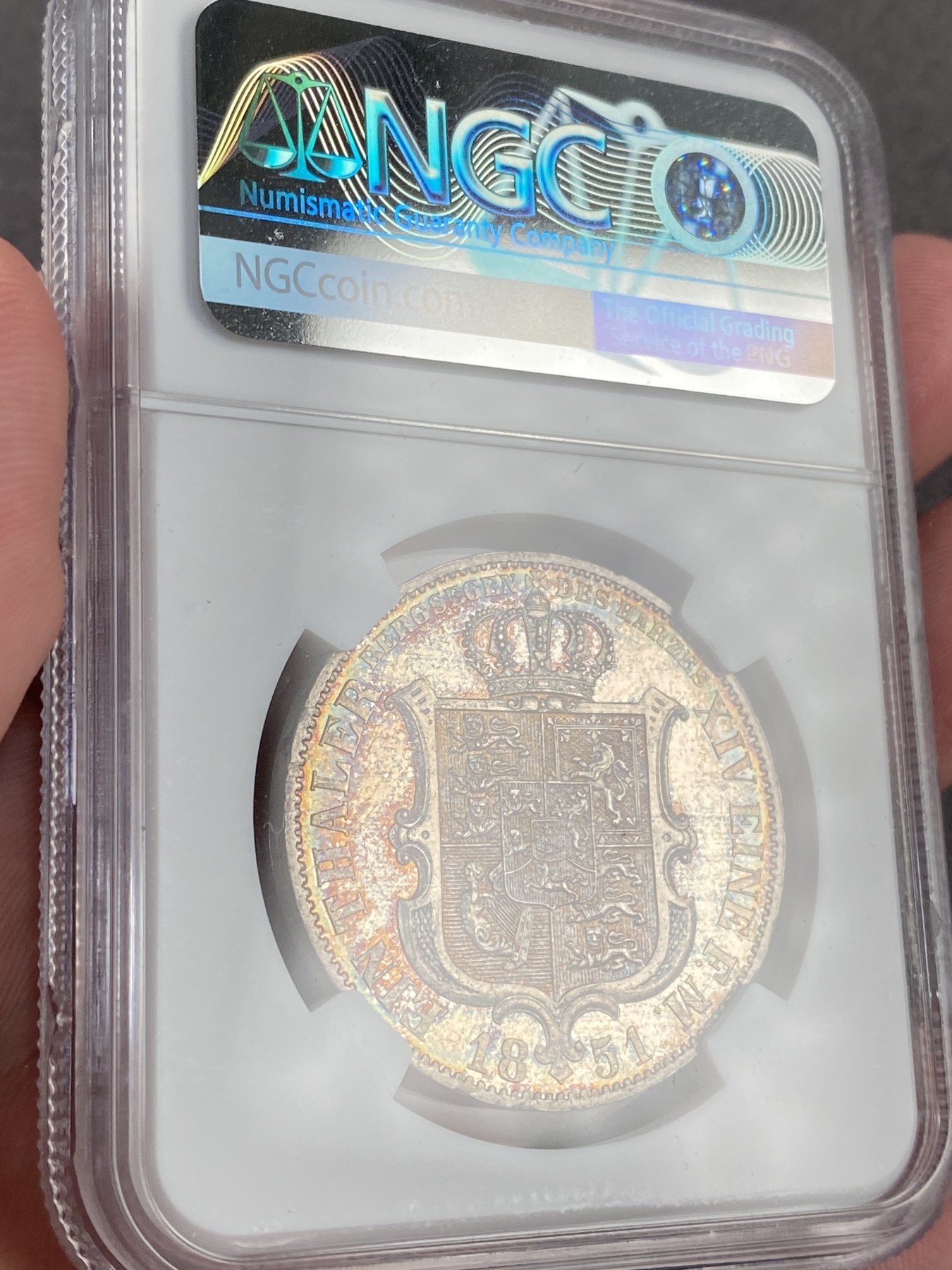 万国钱币拍卖第016期（奢华币章最终章） NGC MS63 1851年德国汉诺威奥古斯特一世盾徽哈慈矿业祈祷流通1泰勒 人像面有些许减重痕 这在后期机制泰勒中可以说是首见 通体五彩镜面 有重度PROOFLIKE感