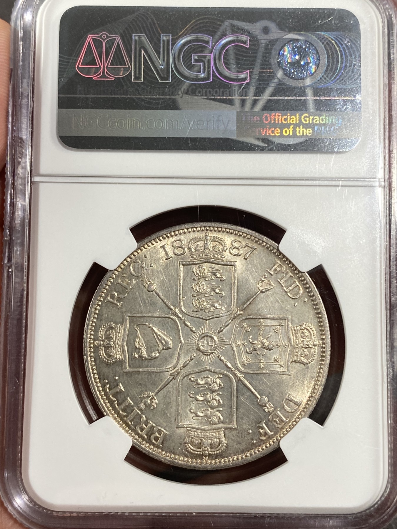 万国钱币拍卖第016期（奢华币章最终章） NGC MS62 1887年英国高冠维多利亚4先令大银币 高点完美转光