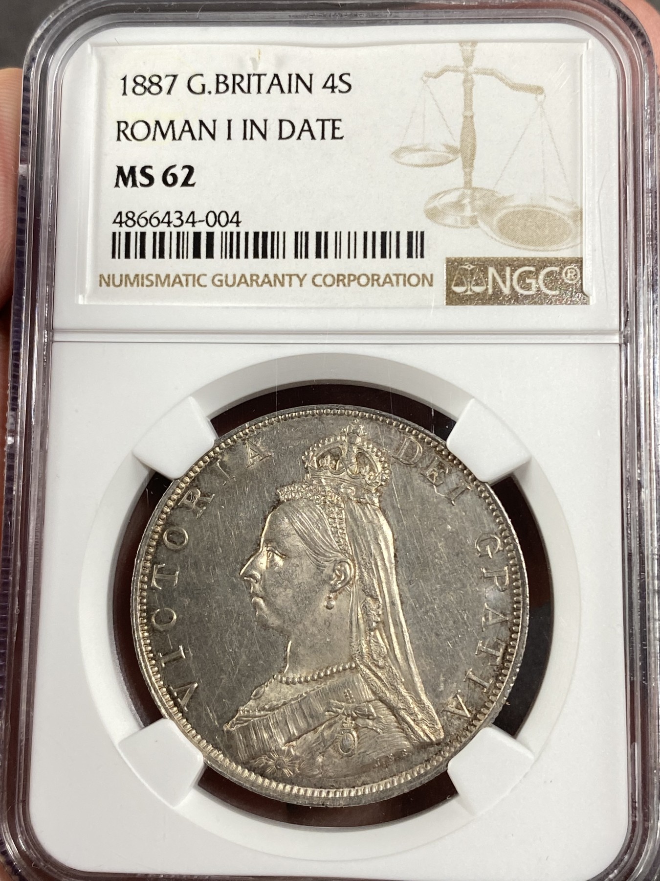 万国钱币拍卖第016期（奢华币章最终章） NGC MS62 1887年英国高冠维多利亚4先令大银币 高点完美转光