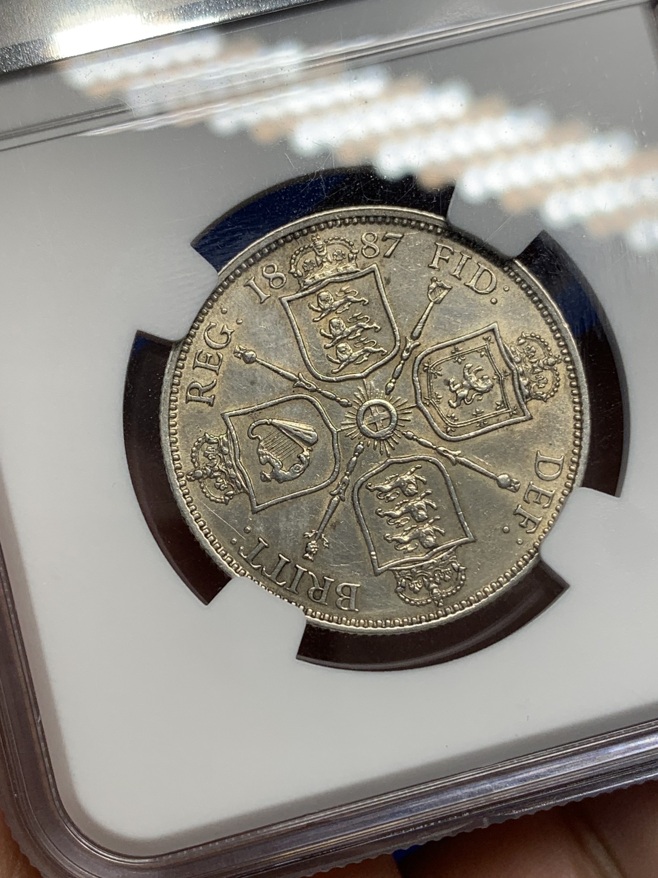 《竞宝斋》第196场-周日，周一 2场 (全场包邮) NGC AUD 英国1887年维多利亚高冠1弗洛林银币