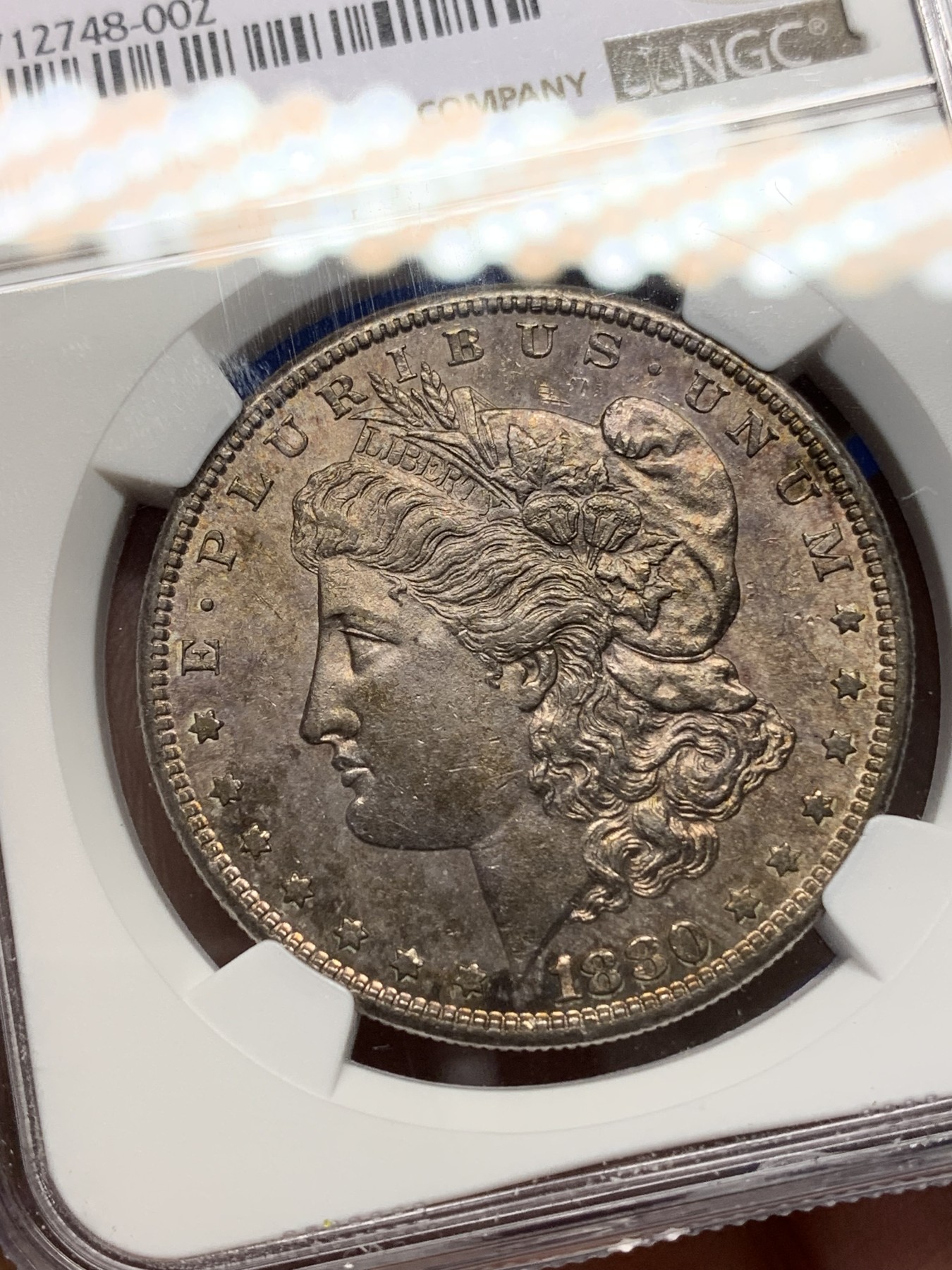 《竞宝斋》第196场-周日，周一 2场 (全场包邮) NGC-MS63 美国 1880年（S） 摩根银币 紫金彩包浆 状态非常不错