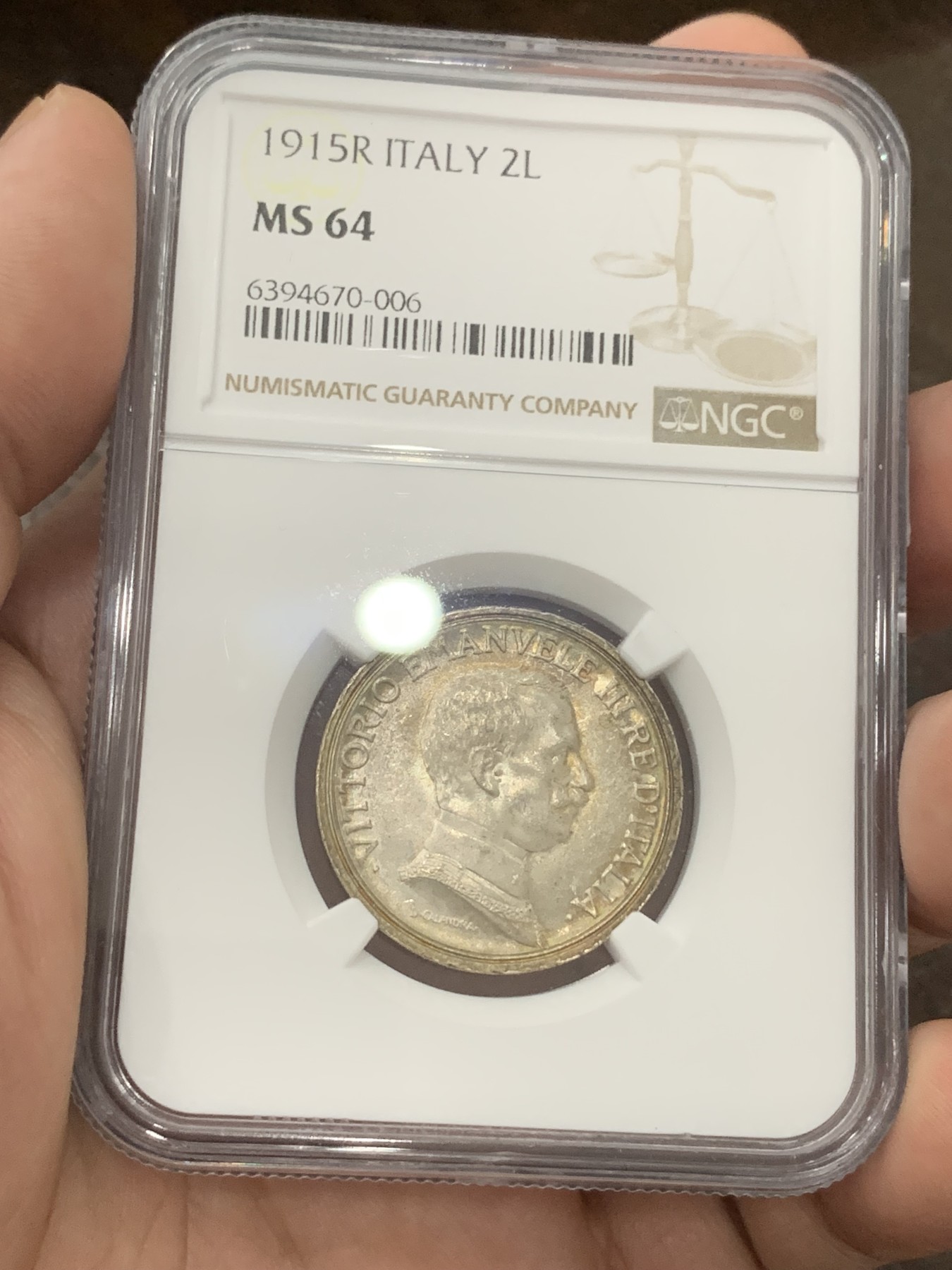 《竞宝斋》第196场-周日，周一 2场 (全场包邮) NGC MS64 意大利1915年战车女神2里拉银币，双面五彩包浆，底板丝滑，高分小马车能有这样的包浆也不多见。