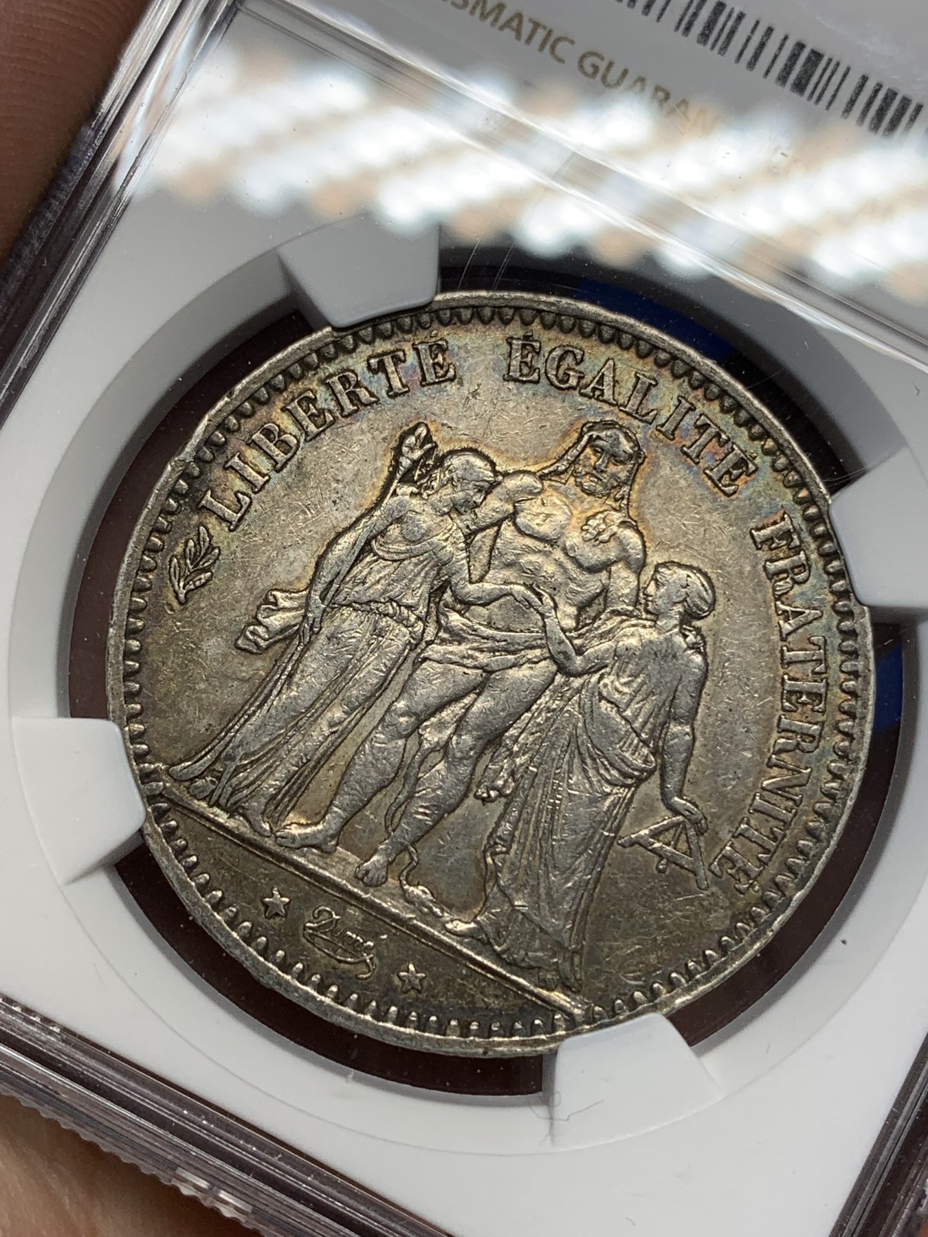 《竞宝斋》第196场-周日，周一 2场 (全场包邮) NGC AUD 法国1875年大力神5法郎银币 小A版 铸造量是1873年的1/10