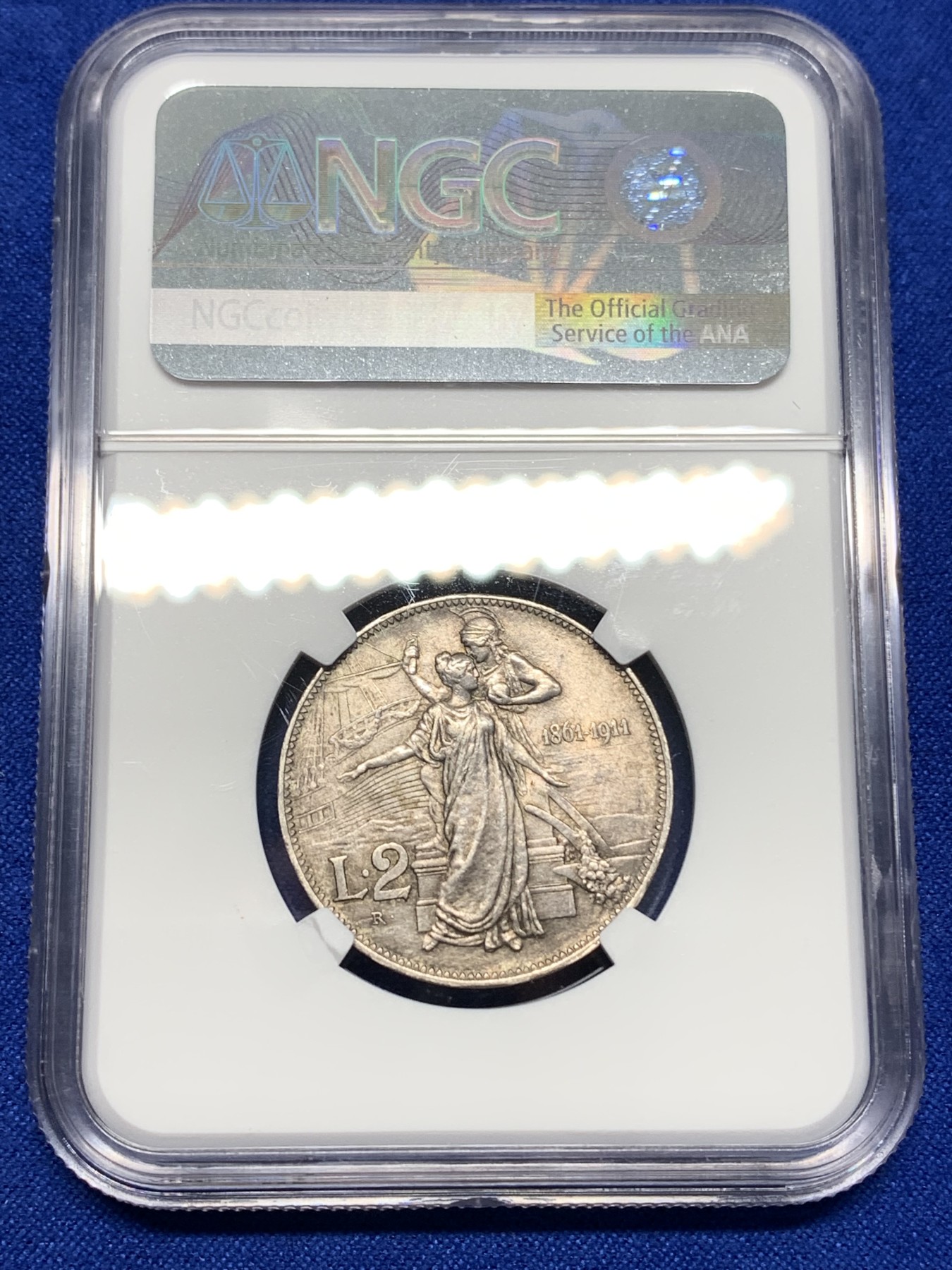 《竞宝斋》第196场-周日，周一 2场 (全场包邮) NGC MS62 意大利1911建国50周年2里拉银币，这个品种的MS还是比较少的，值得收藏。