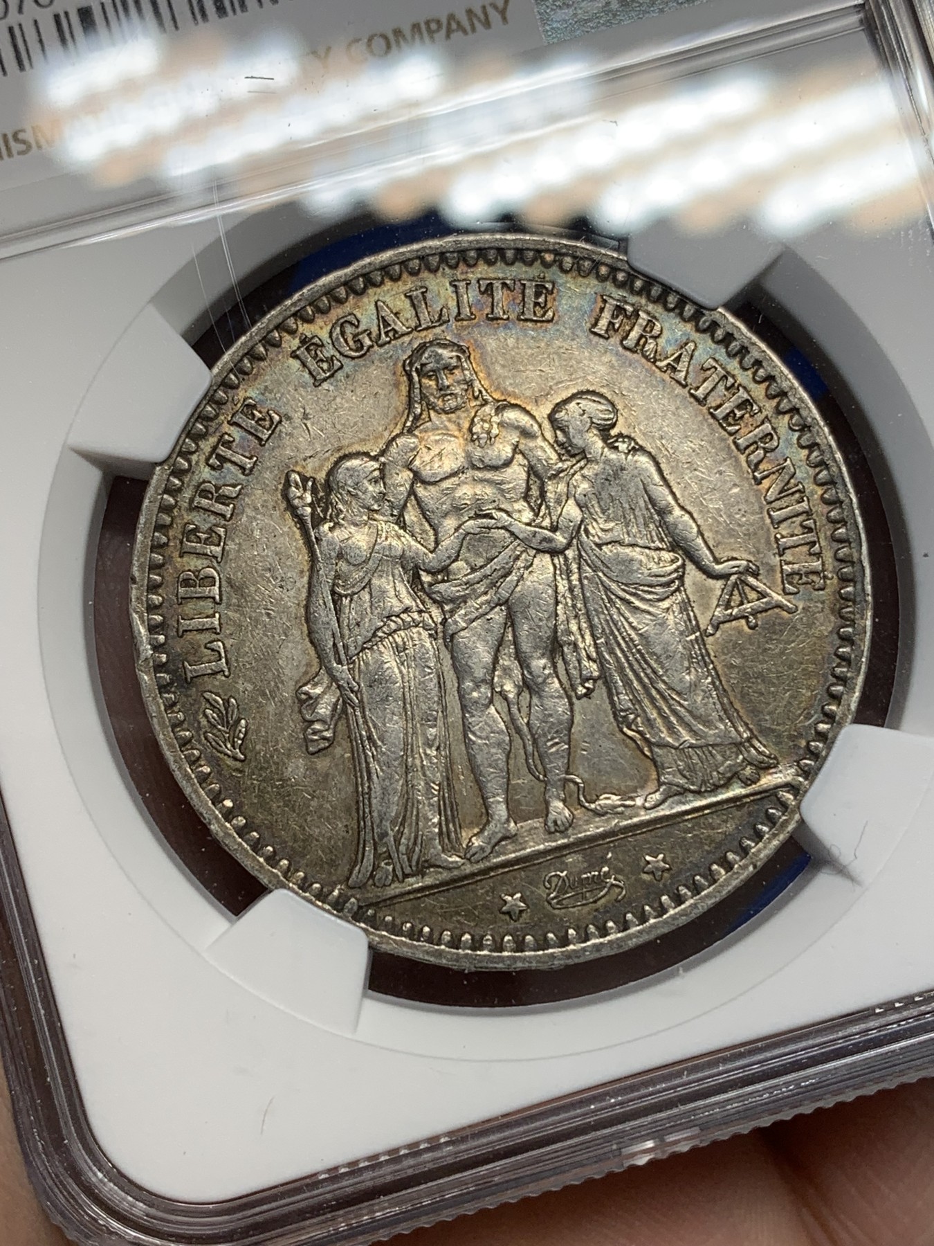 《竞宝斋》第196场-周日，周一 2场 (全场包邮) NGC AUD 法国1875年大力神5法郎银币 小A版 铸造量是1873年的1/10