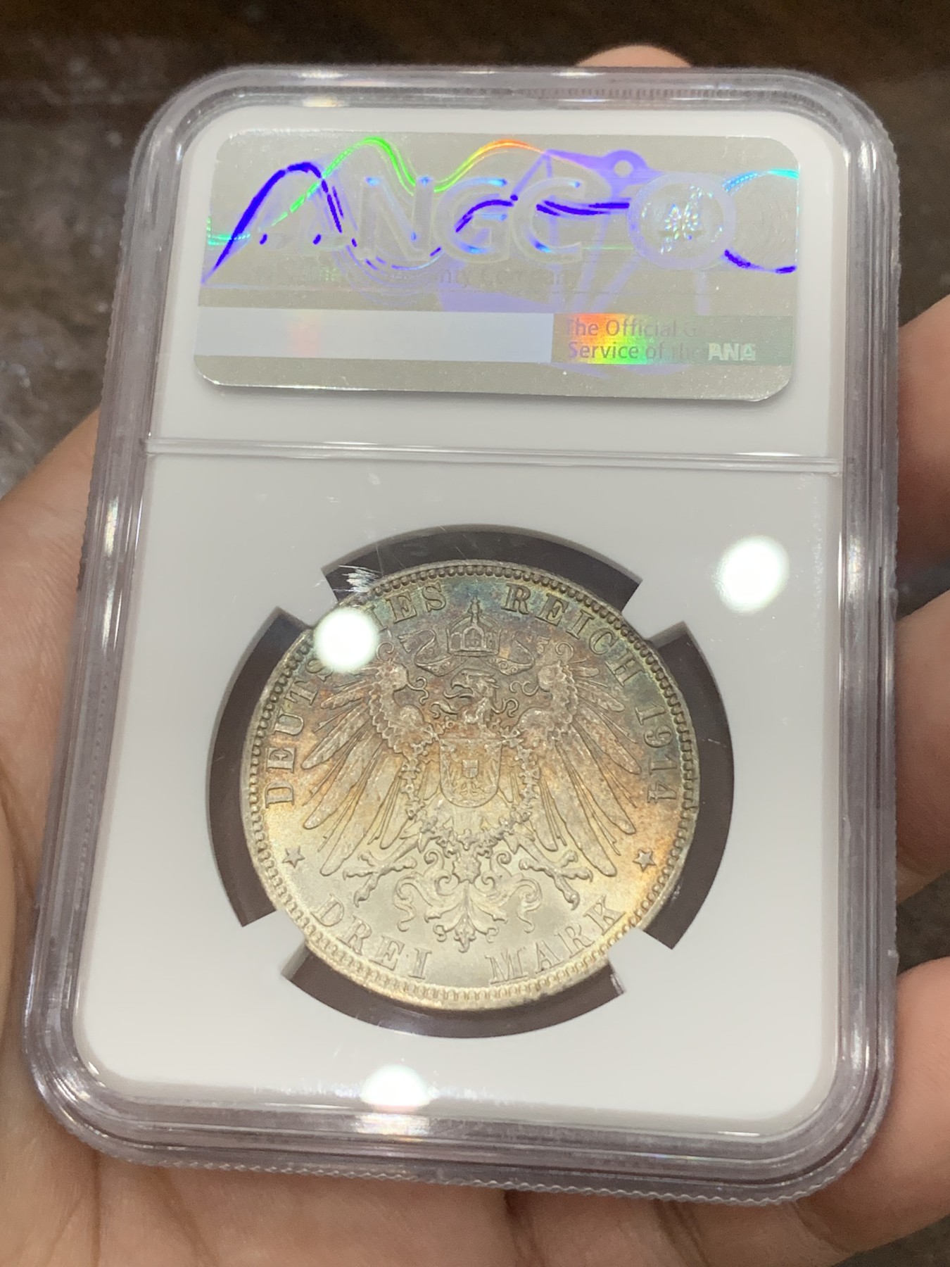 《竞宝斋》第196场-周日，周一 2场 (全场包邮) NGC MS64 德国1911年汉堡自由市3马克银币，双面炫彩包浆，不是大白币可以比的。