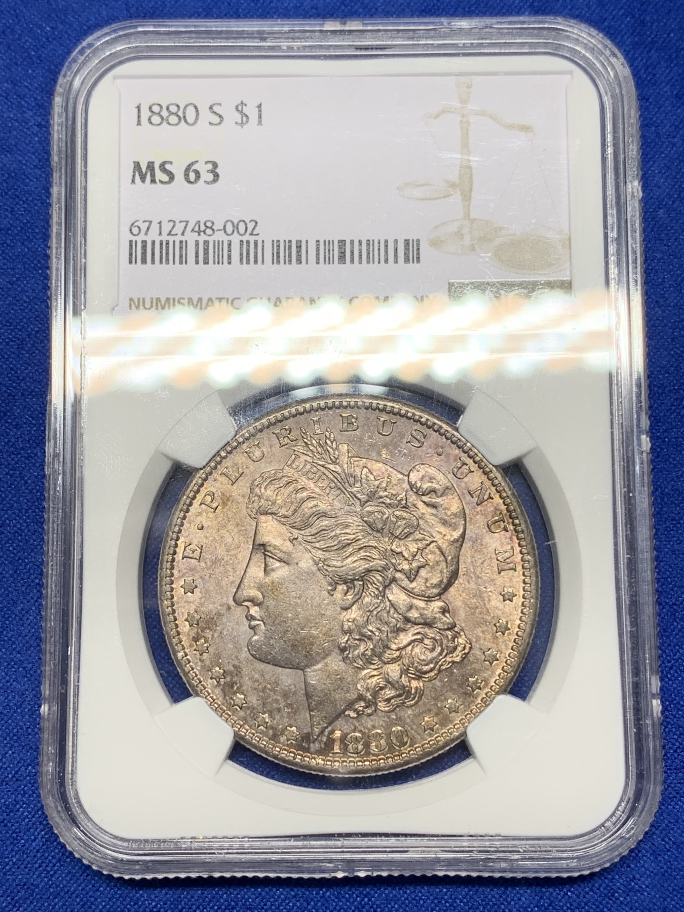 《竞宝斋》第196场-周日，周一 2场 (全场包邮) NGC-MS63 美国 1880年（S） 摩根银币 紫金彩包浆 状态非常不错