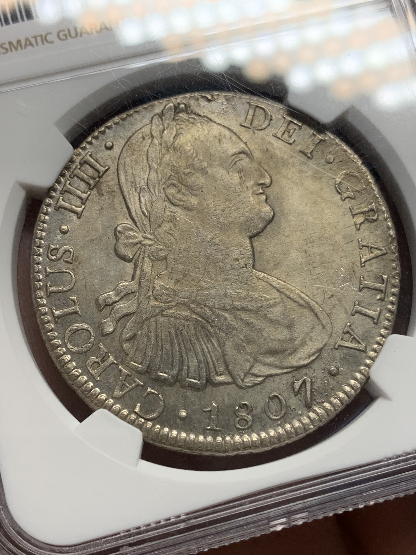 《竞宝斋》第196场-周日，周一 2场 (全场包邮) NGC-MS62 西属墨西哥1807 MO TH卡四 人像双柱 8瑞尔银币  双面淡彩